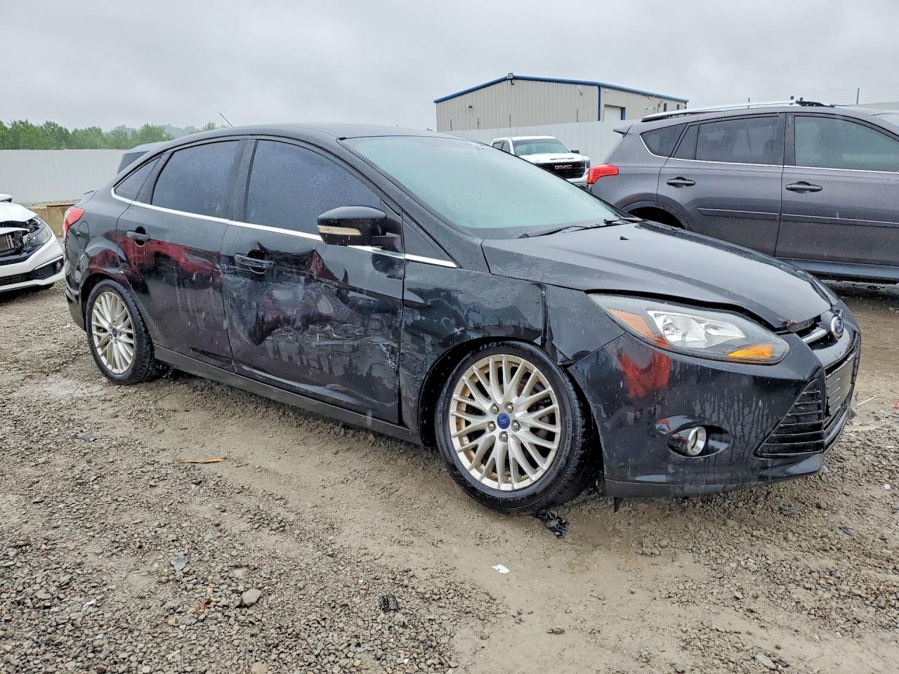 2014 Ford Focus Titanium Black vin: 1FADP3J28EL128870