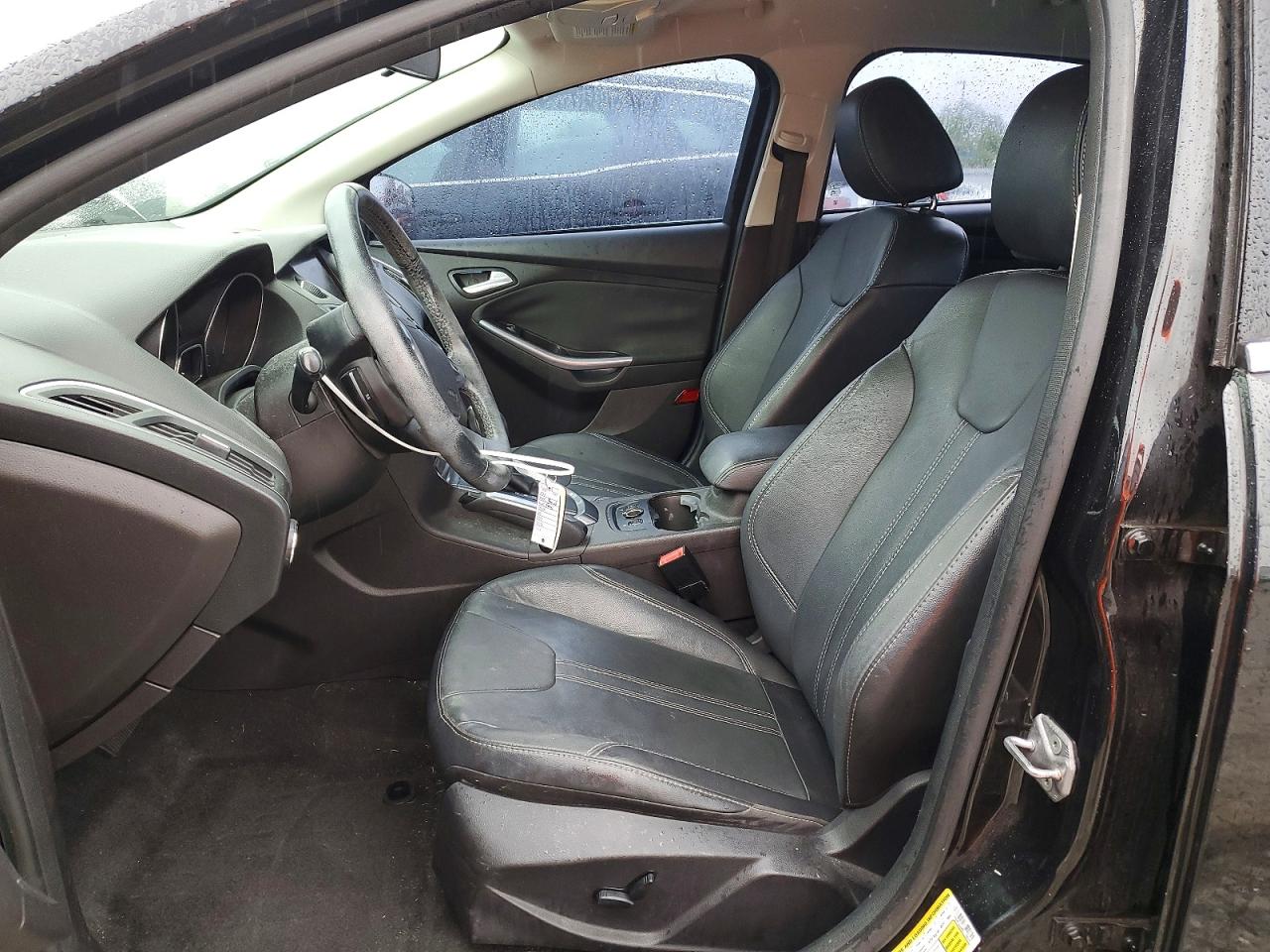 2014 Ford Focus Titanium Black vin: 1FADP3J28EL128870