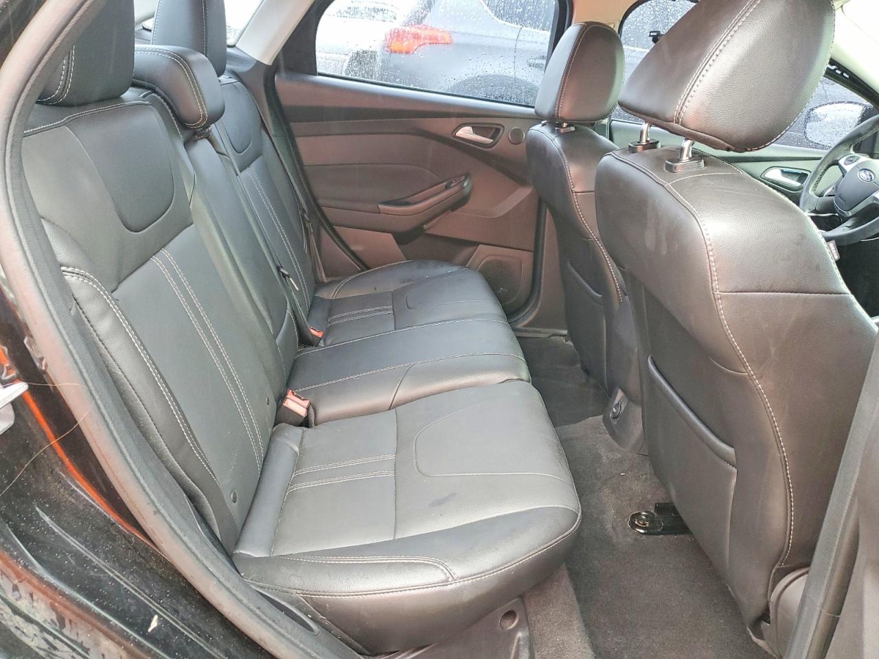 2014 Ford Focus Titanium Black vin: 1FADP3J28EL128870