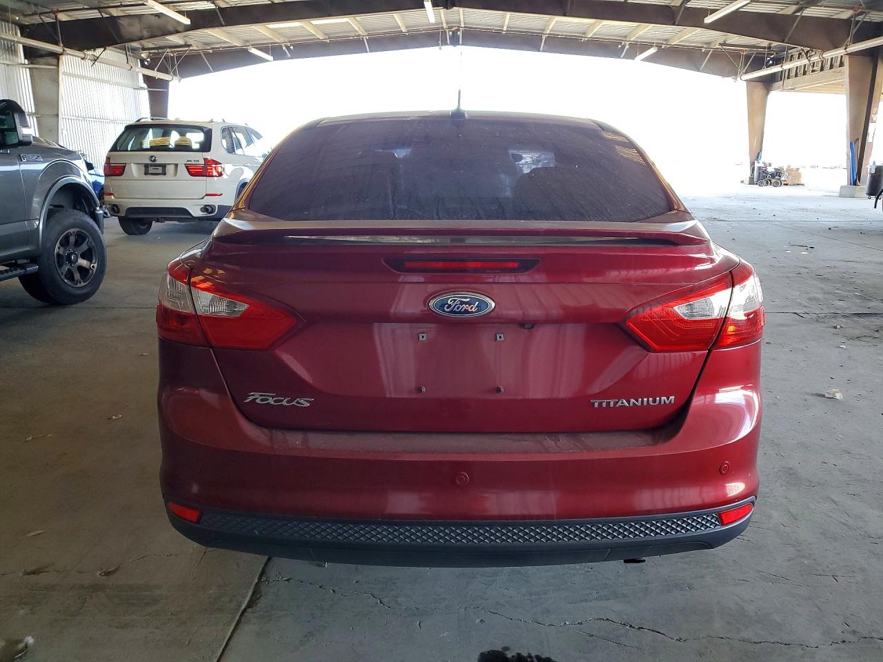2014 Ford Focus Titanium Red vin: 1FADP3J28EL342421