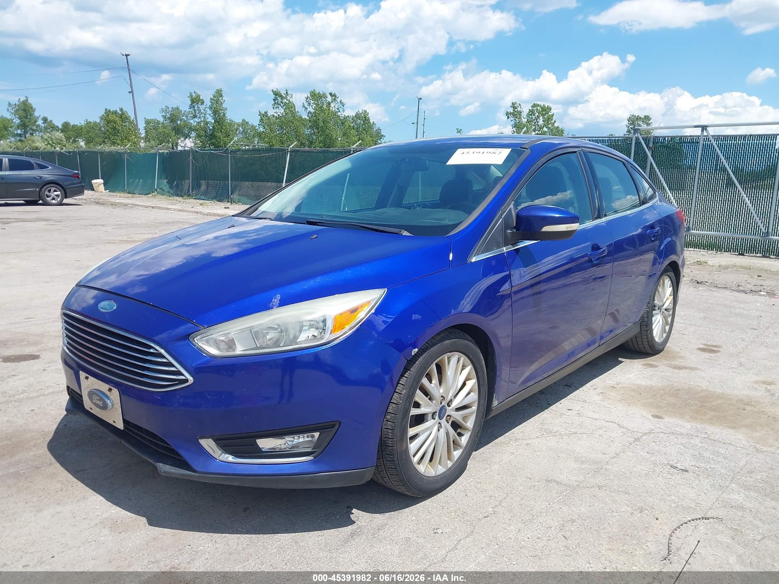 2015 Ford Focus Titanium Blue vin: 1FADP3J28FL275241