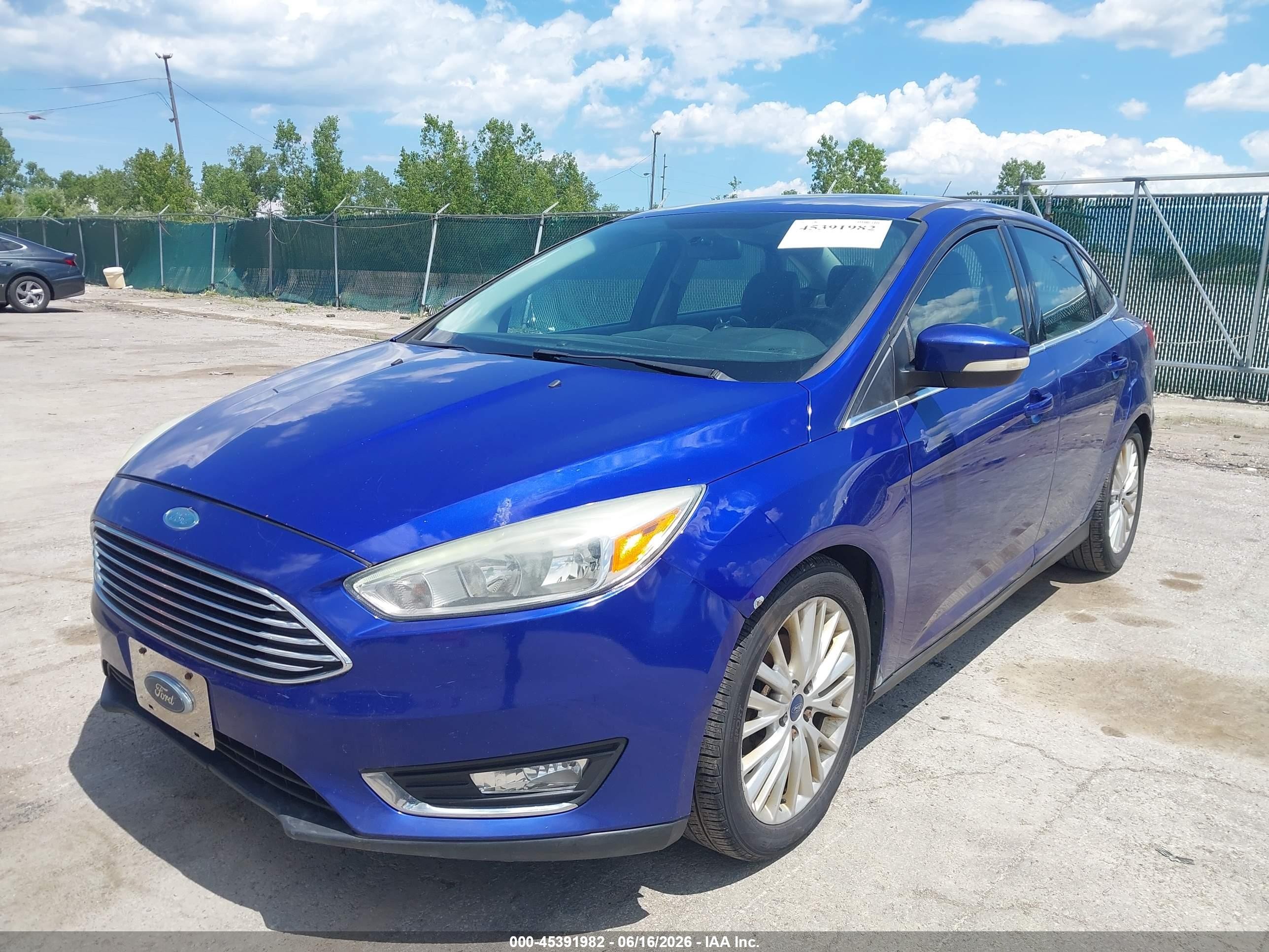 2015 Ford Focus Titanium Blue vin: 1FADP3J28FL275241