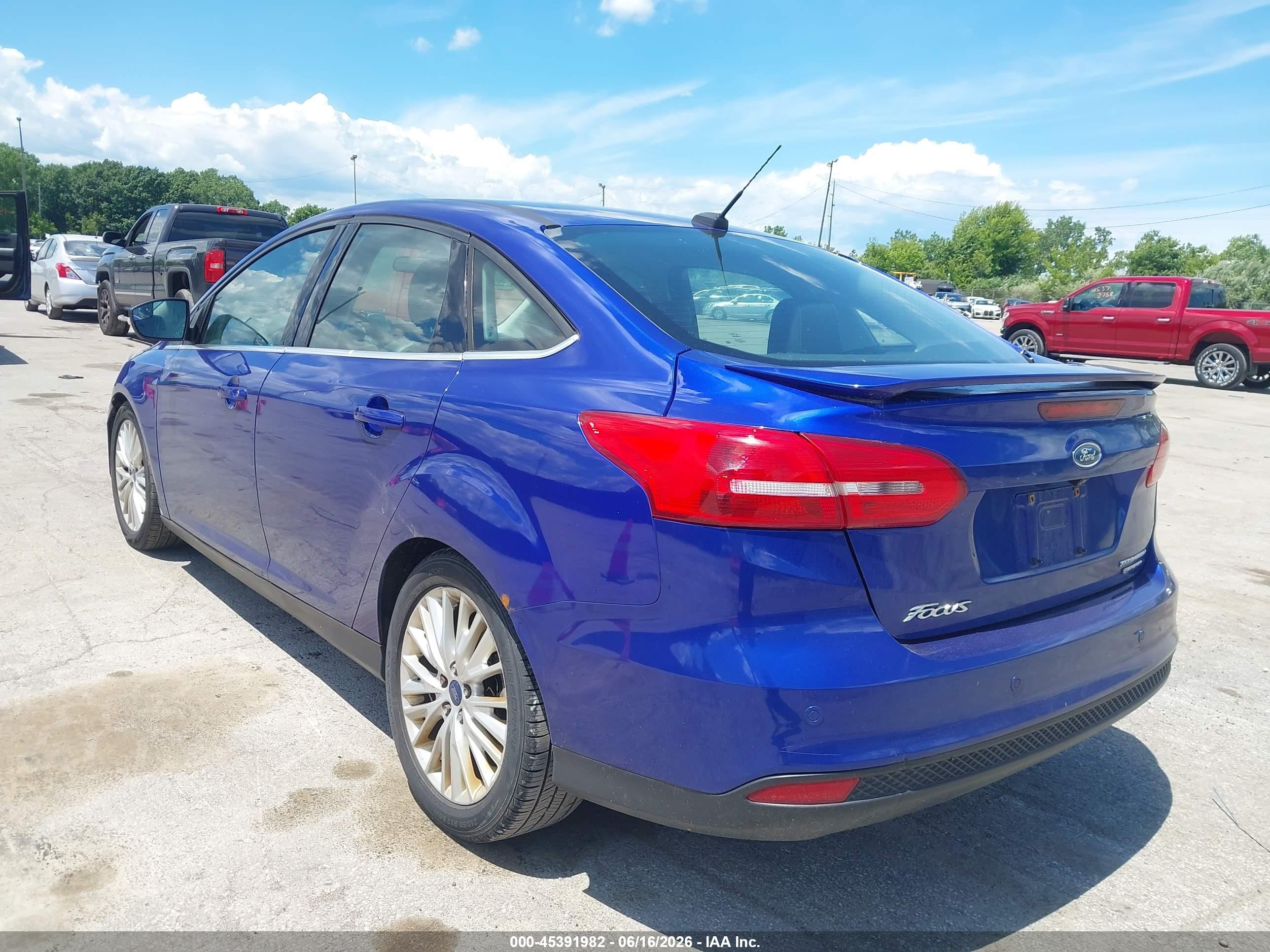 2015 Ford Focus Titanium Blue vin: 1FADP3J28FL275241