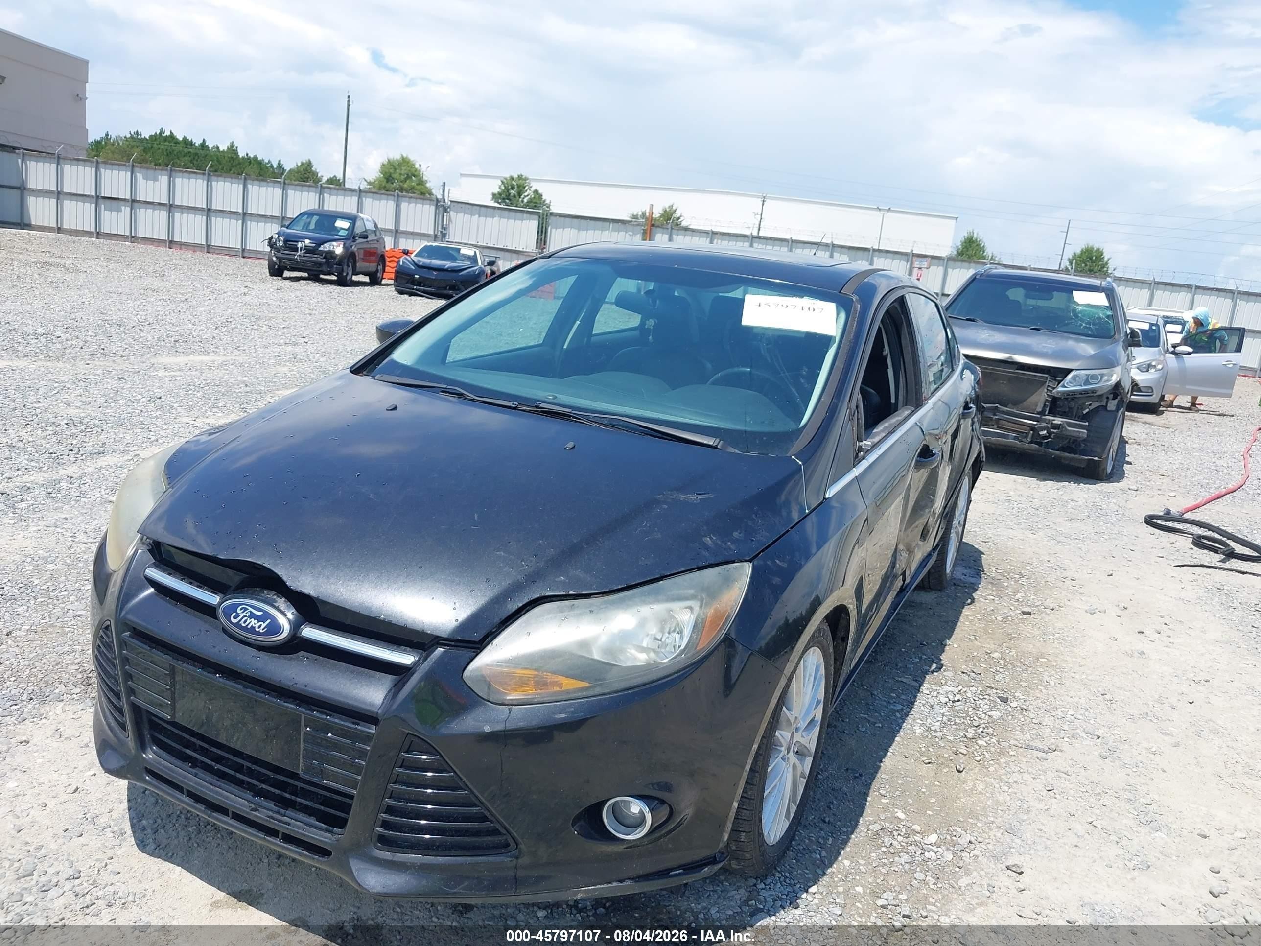 2013 Ford Focus Titanium Black vin: 1FADP3J2XDL198708