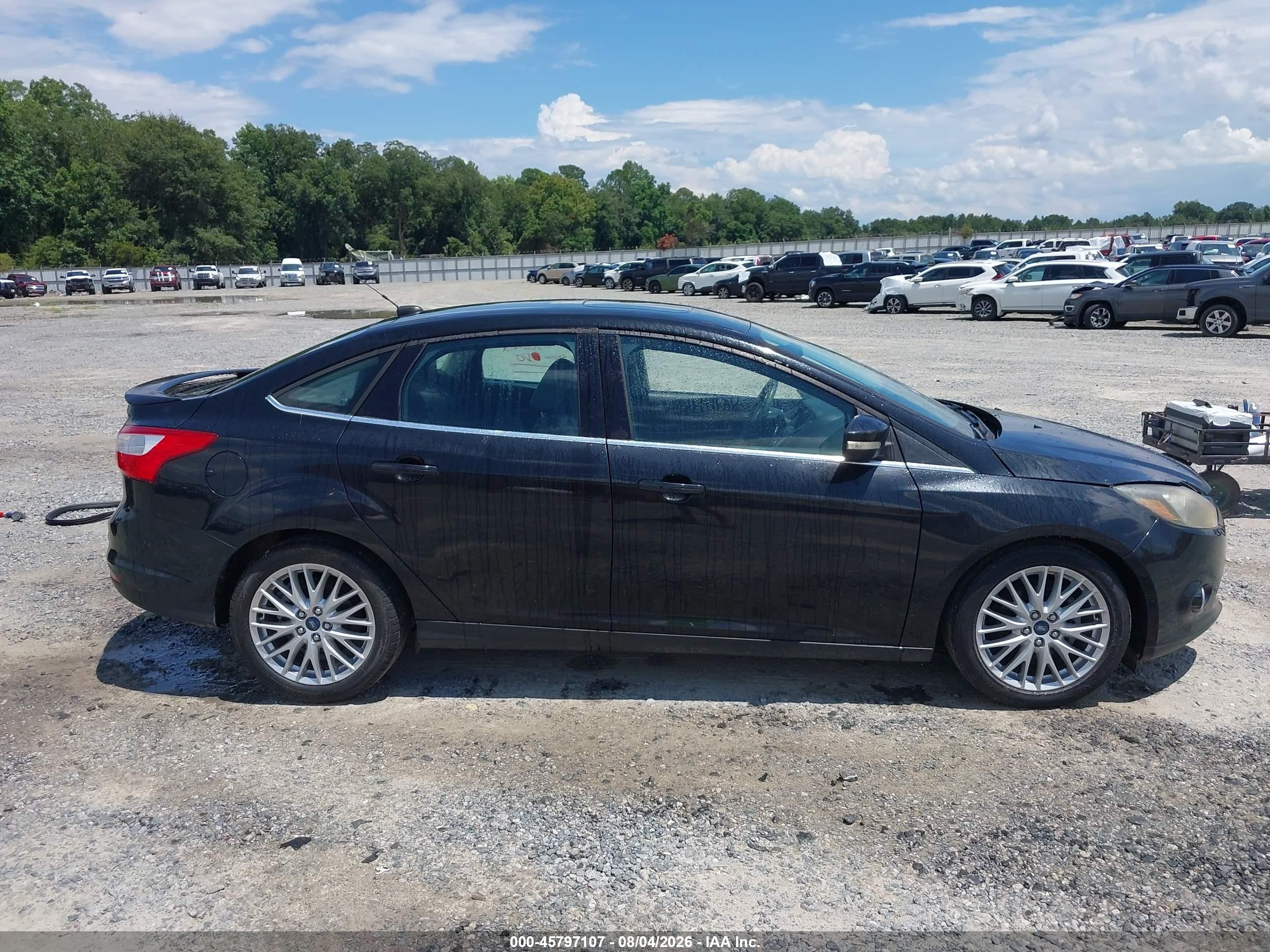 2013 Ford Focus Titanium Black vin: 1FADP3J2XDL198708