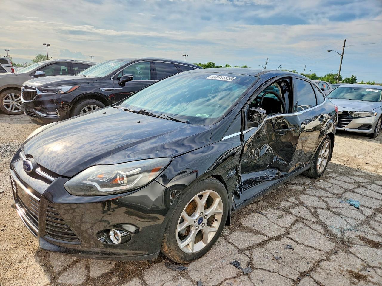 2014 Ford Focus Titanium Black vin: 1FADP3J2XEL107177