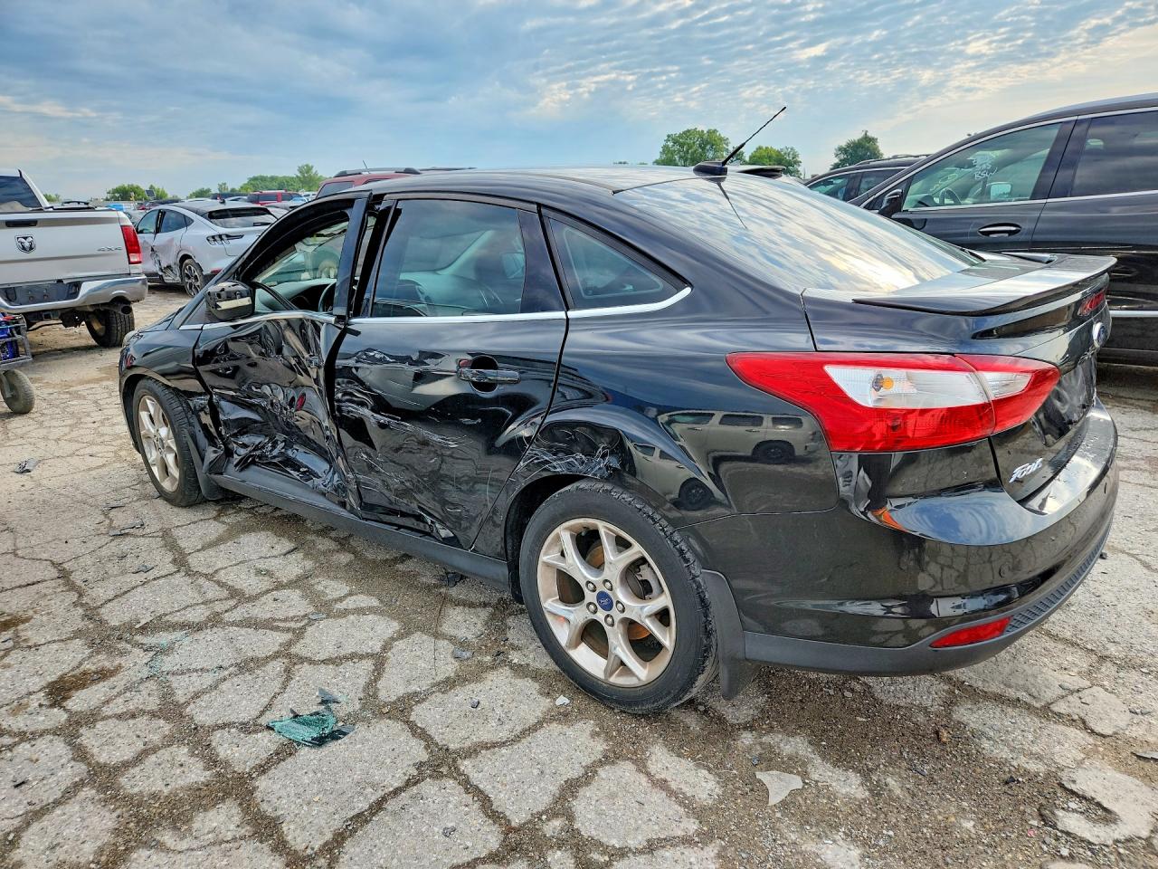 2014 Ford Focus Titanium Black vin: 1FADP3J2XEL107177