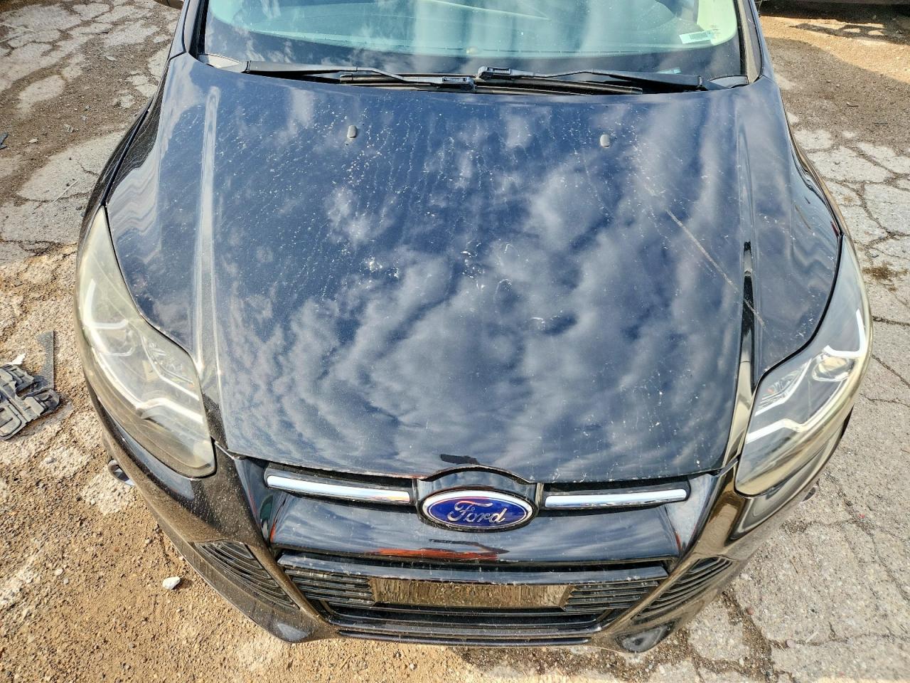 2014 Ford Focus Titanium Black vin: 1FADP3J2XEL107177
