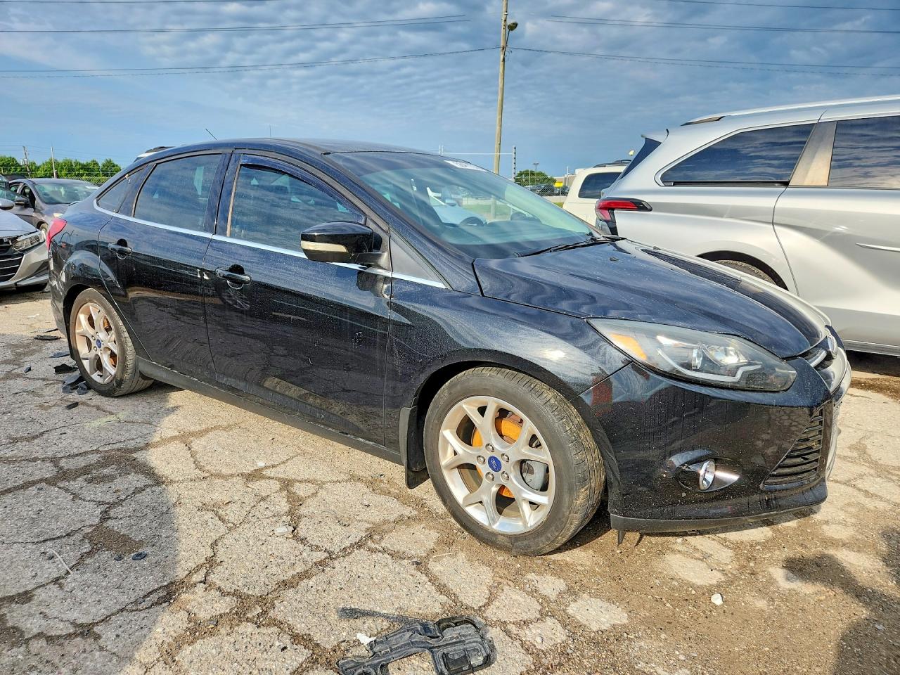 2014 Ford Focus Titanium Black vin: 1FADP3J2XEL107177