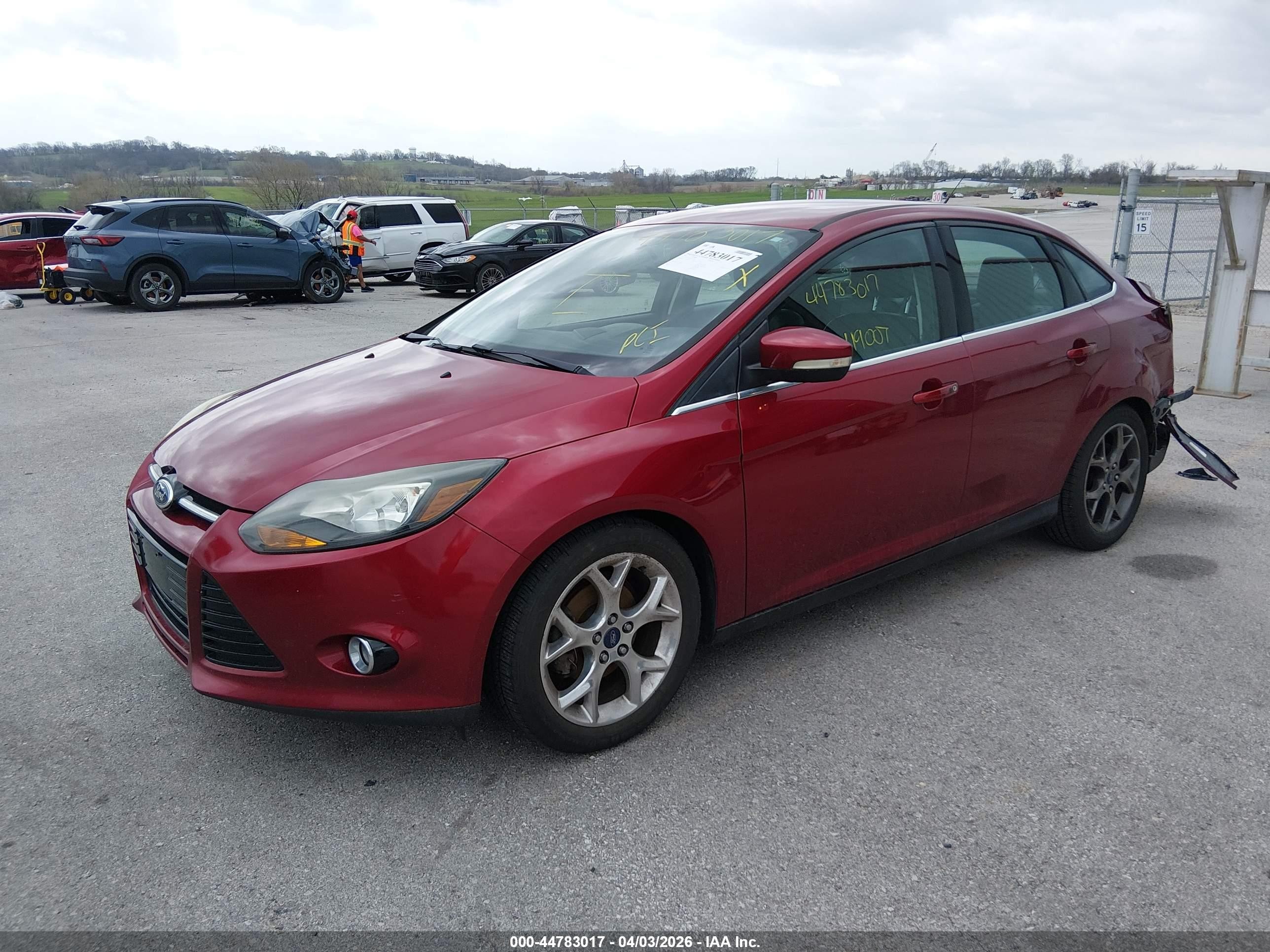 2014 Ford Focus Titanium Red vin: 1FADP3J2XEL155794