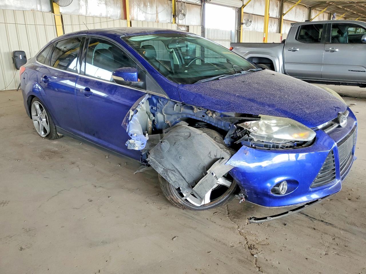 2014 Ford Focus Titanium Blue vin: 1FADP3J2XEL199021