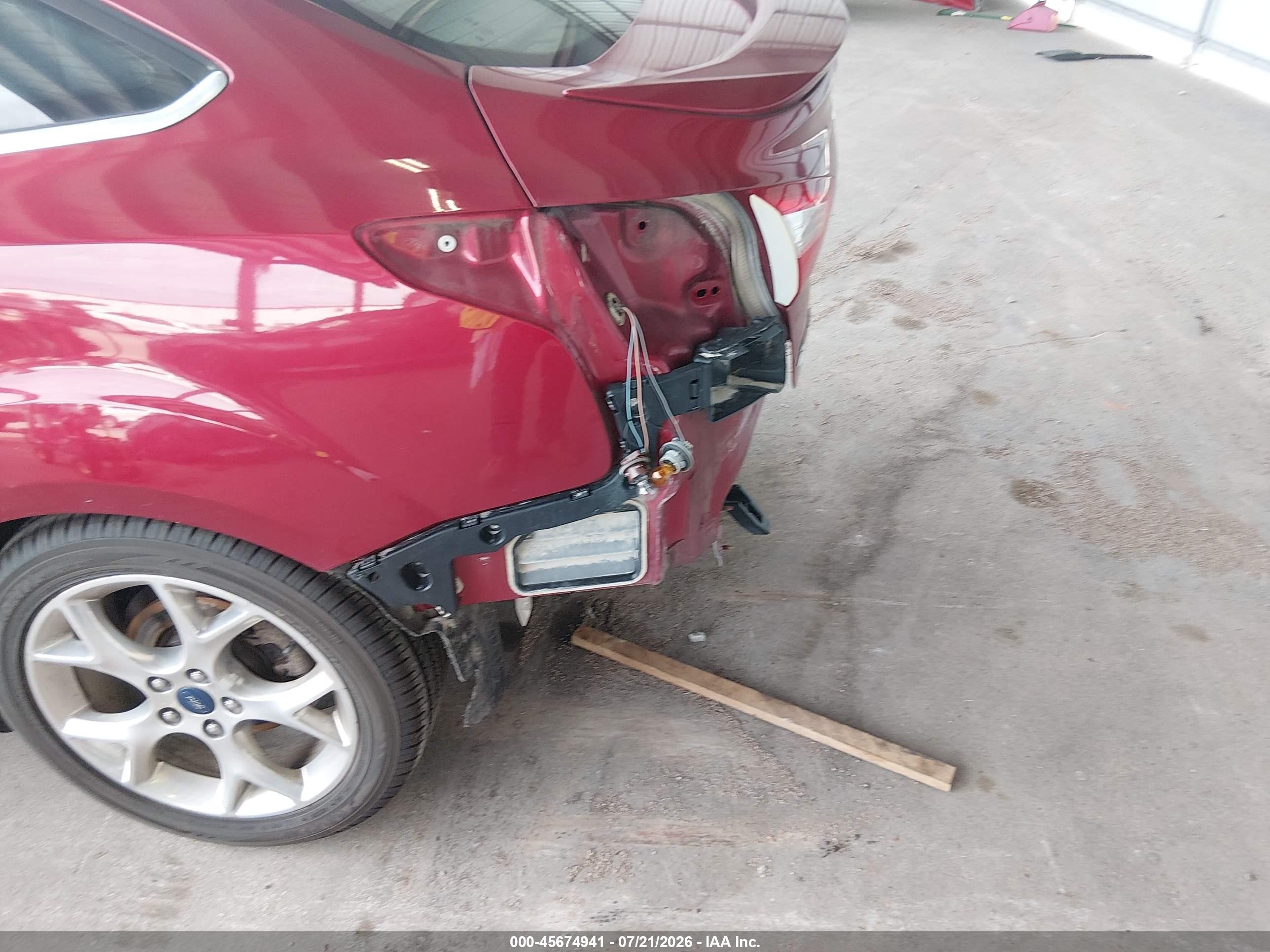 2014 Ford Focus Titanium Red vin: 1FADP3J2XEL349368