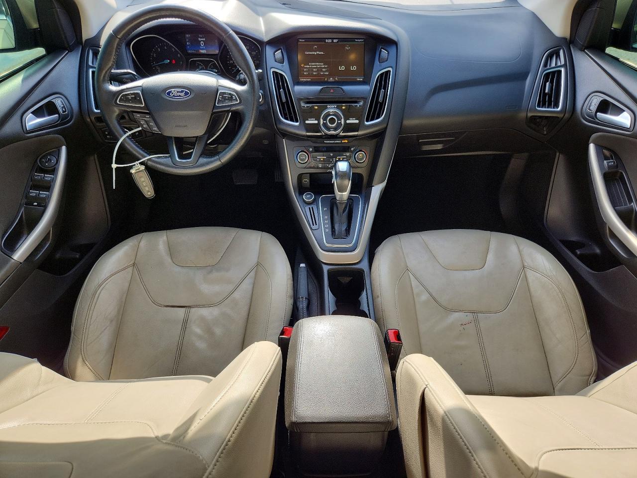 2015 Ford Focus Titanium Gold vin: 1FADP3J2XFL209287
