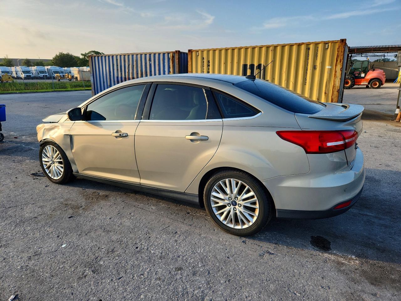 2015 Ford Focus Titanium Gold vin: 1FADP3J2XFL209287
