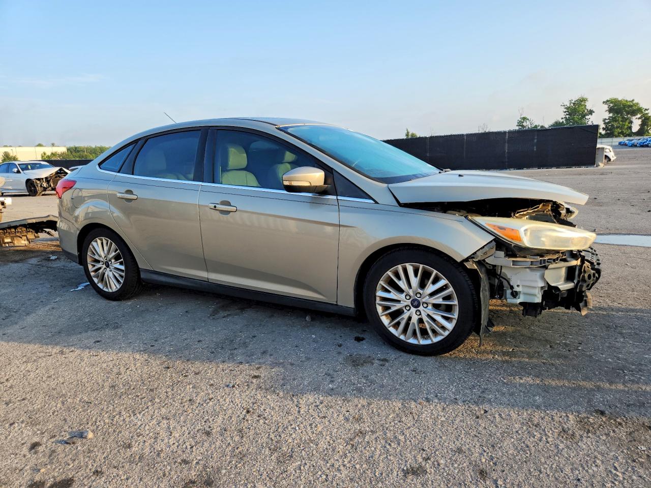 2015 Ford Focus Titanium Gold vin: 1FADP3J2XFL209287
