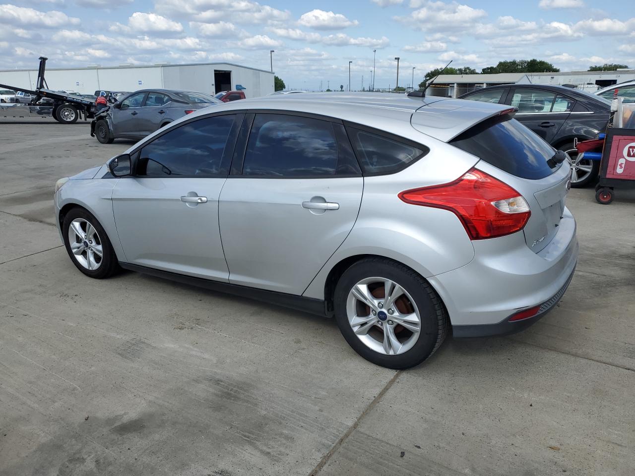 2014 Ford Focus Se Silver vin: 1FADP3K21EL322915 Damage: Left Rear Door, Dent(S) W/ Paint Dmg, 7 To 8 Inches