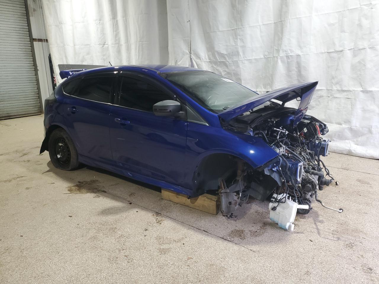 2013 Ford Focus St Blue vin: 1FADP3L94DL196799 Damage: Right Front Wheel, Missing, Replacement Required