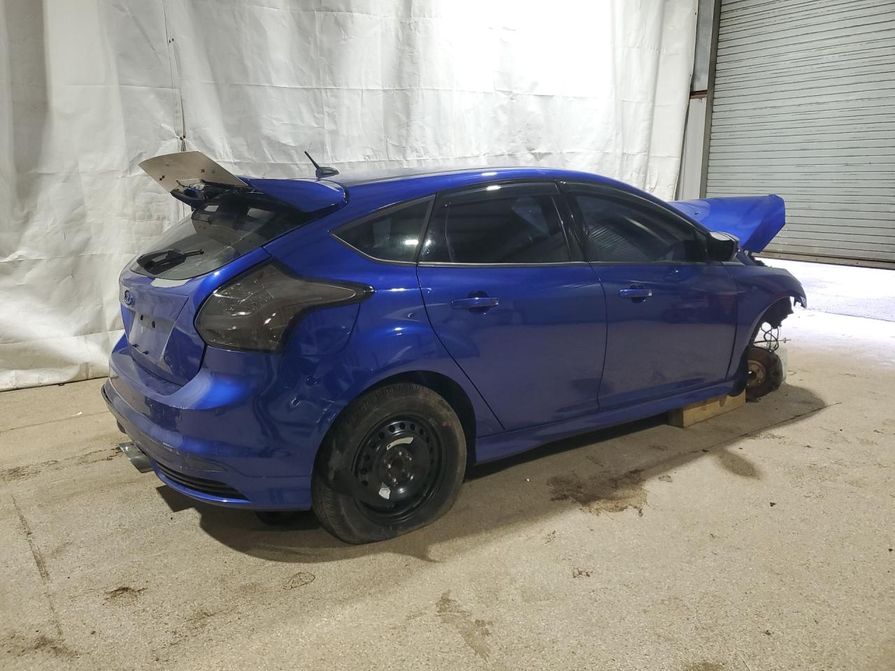 2013 Ford Focus St Blue vin: 1FADP3L94DL196799 Damage: Right Rear Tire, Flat, Repair Required