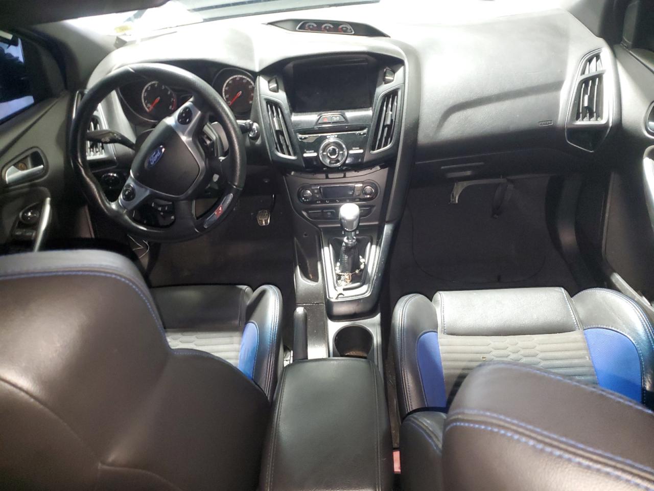 2013 Ford Focus St Blue vin: 1FADP3L94DL196799 Damage: Right Front Seat Cushion, Burn Hole, 1/8 To 1/2 Inch