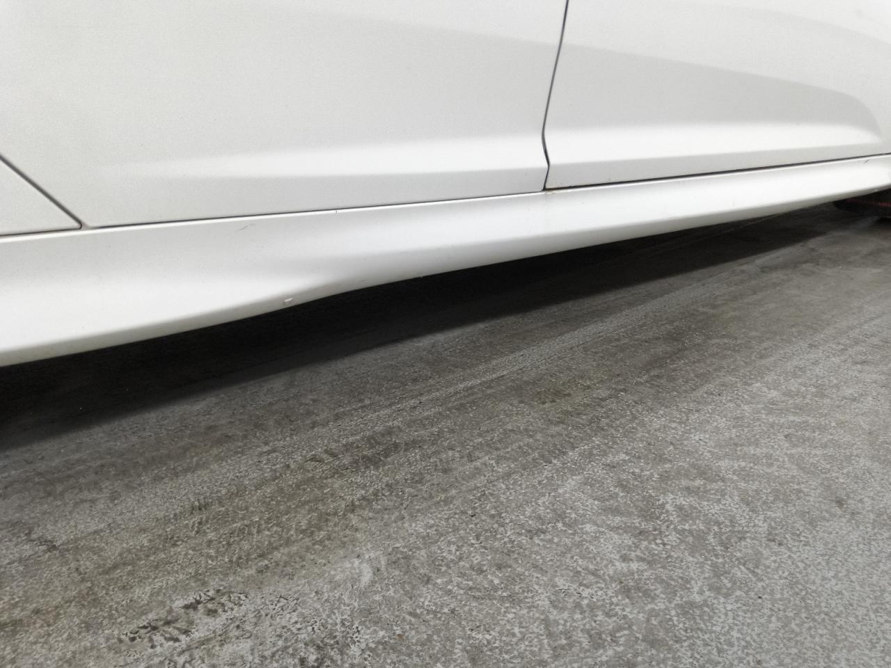 2014 Ford Focus St White vin: 1FADP3L94EL259806 Damage: Right Rocker Panel Molding, Heavy Scratch, 1/2 To 1 Inch
