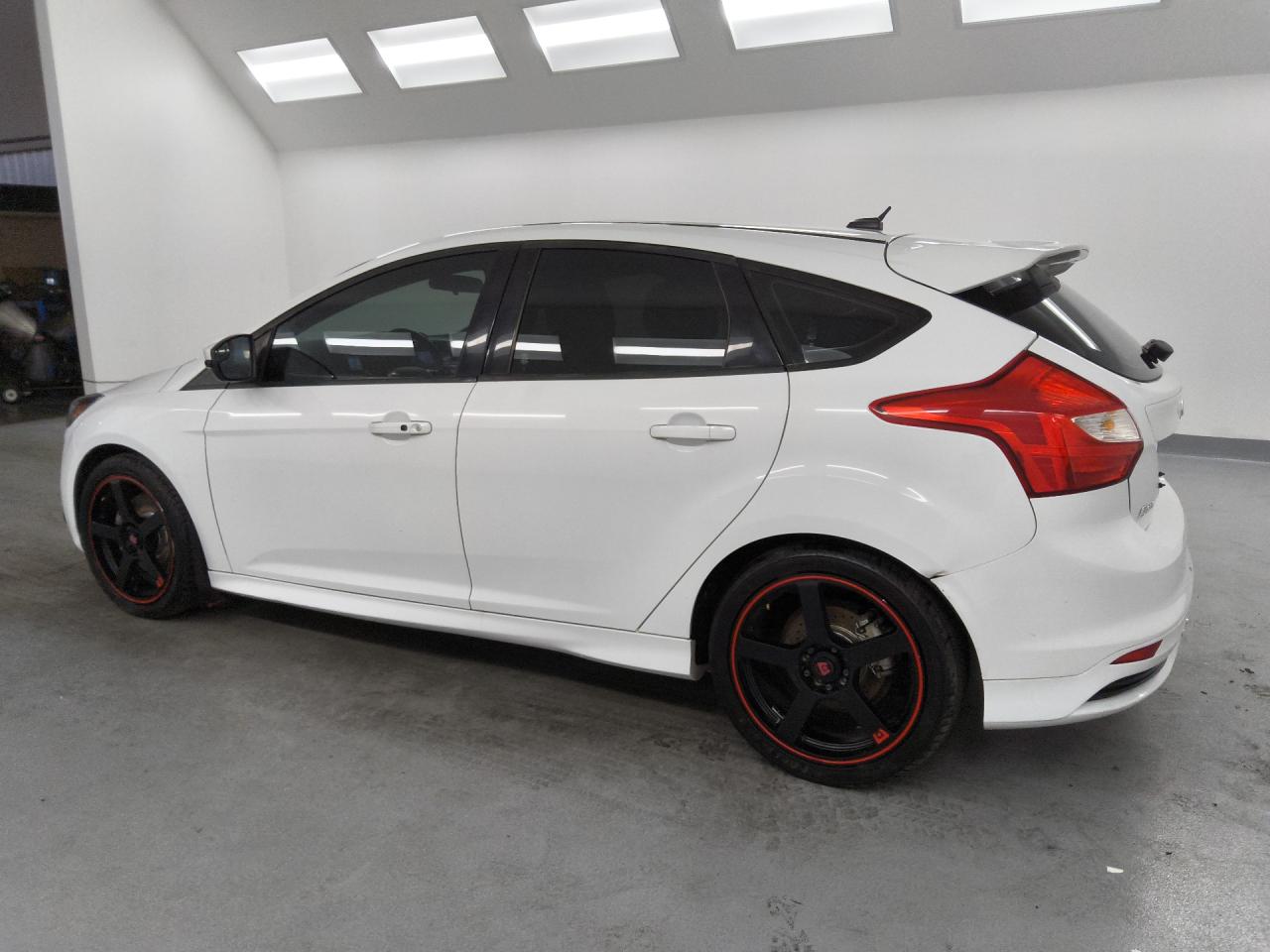 2014 Ford Focus St White vin: 1FADP3L94EL259806 Damage: Left Qtr Panel, Dent(S) W/ Paint Dmg, 2 To 3 Inches