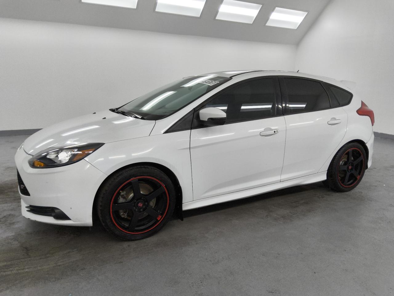 2014 Ford Focus St White vin: 1FADP3L94EL259806 Damage: Left Front Wheel, Aftermarket, Acceptable