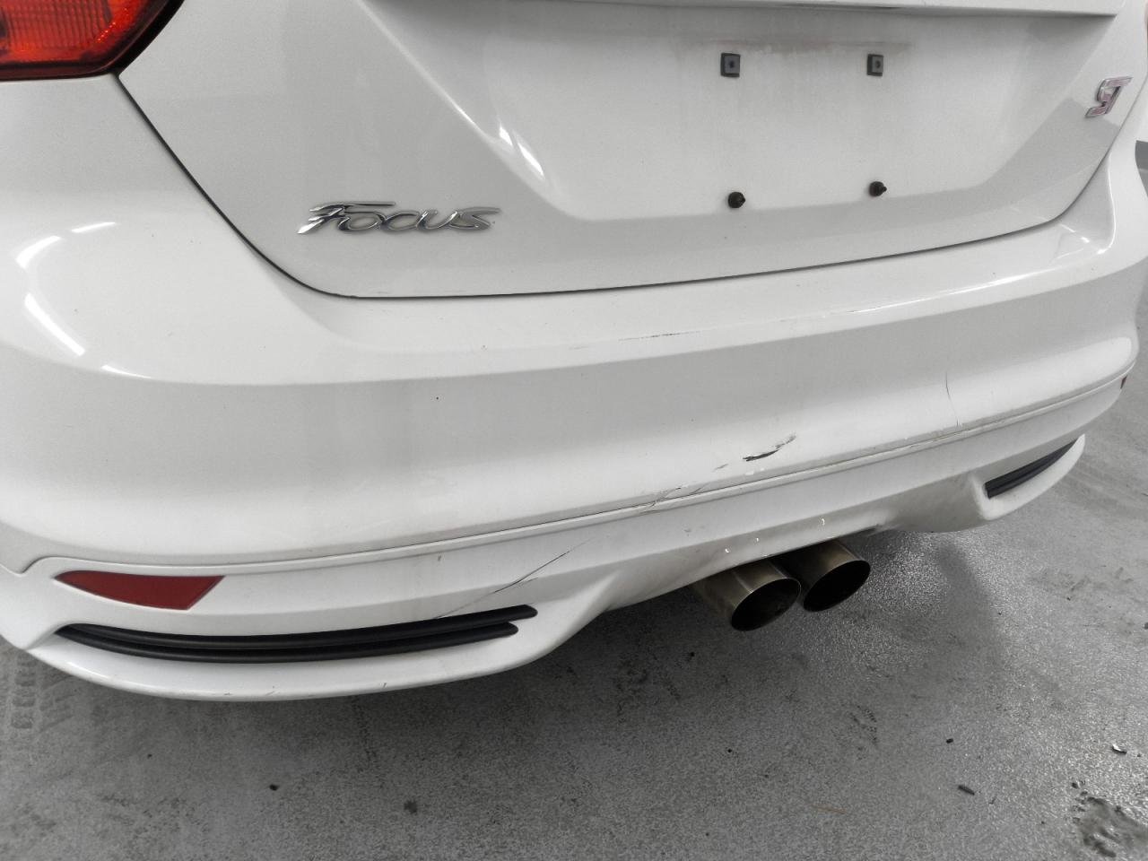 2014 Ford Focus St White vin: 1FADP3L94EL259806 Damage: Rear Bumper, Scraped, 8 To 9 Inches