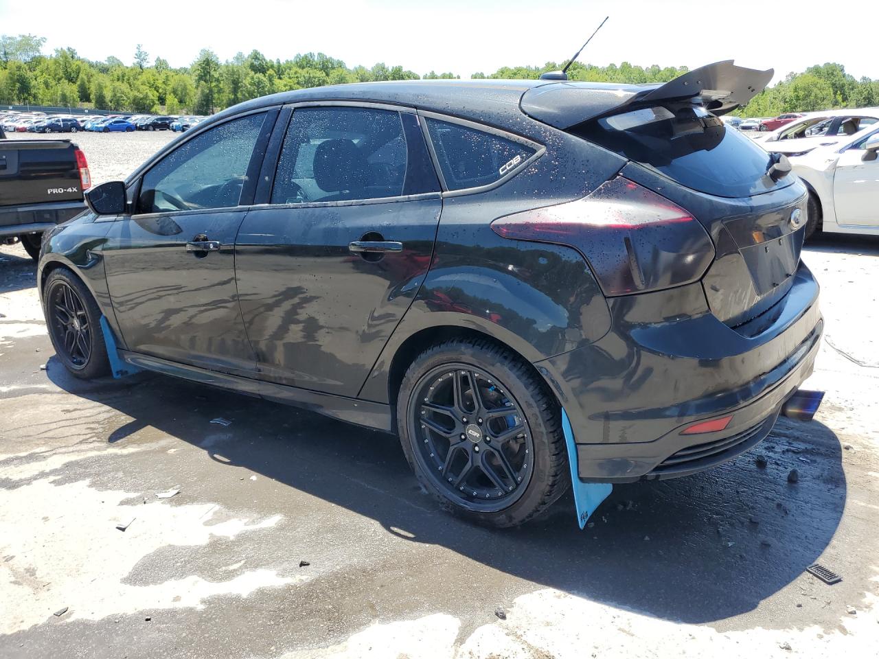 2014 Ford Focus St Black vin: 1FADP3L96EL204399 Damage: Left Tail Light, Aftermarket, Acceptable