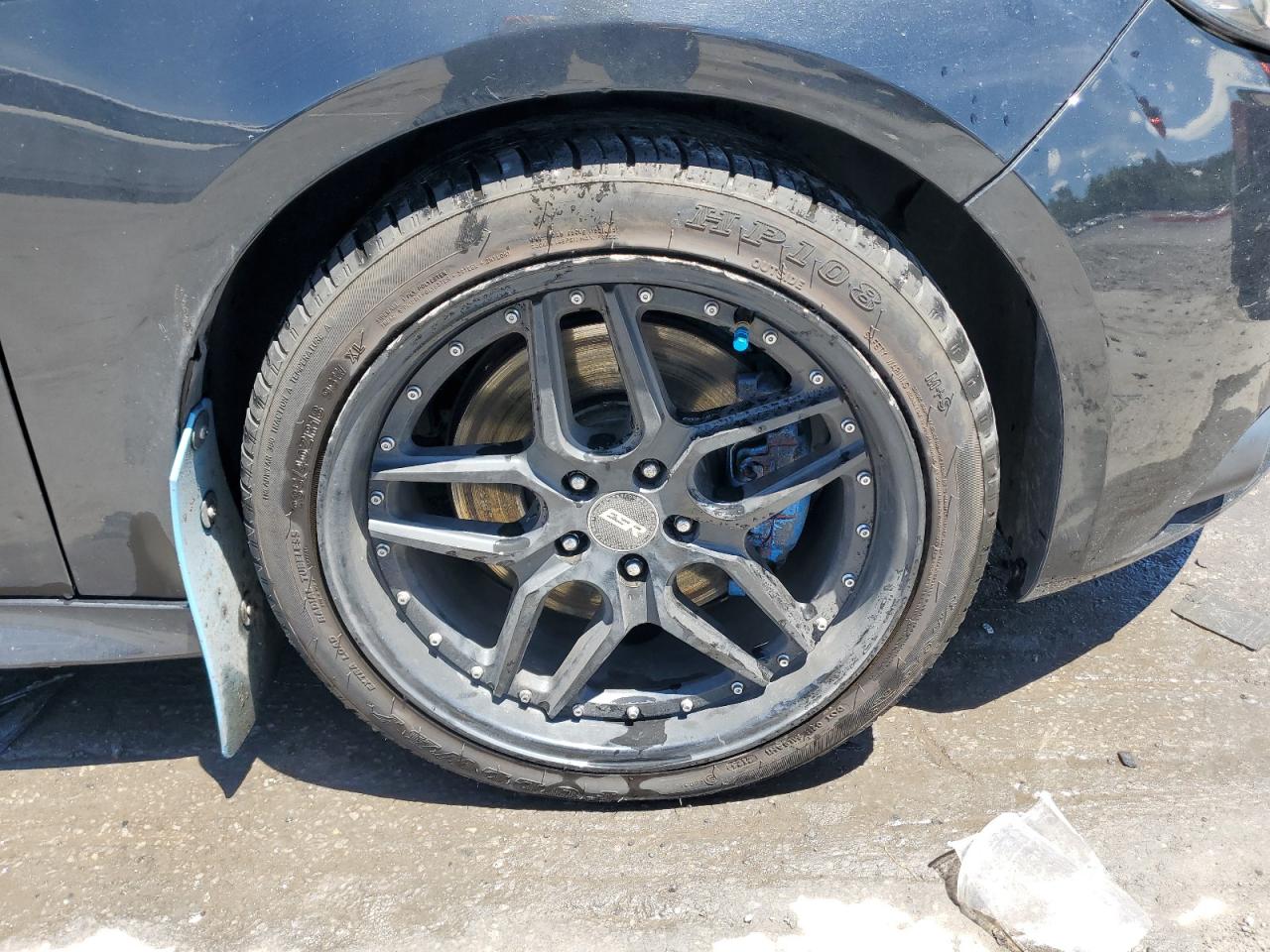 2014 Ford Focus St Black vin: 1FADP3L96EL204399 Damage: Right Front Wheel, Aftermarket, Acceptable