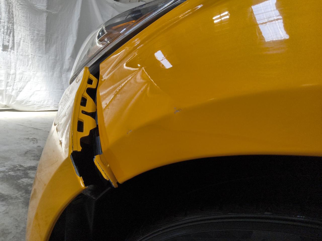 2014 Ford Focus St Yellow vin: 1FADP3L99EL345631 Damage: Left Front Fender, Dent(S) W/ Paint Dmg, 1 To 2 Inches