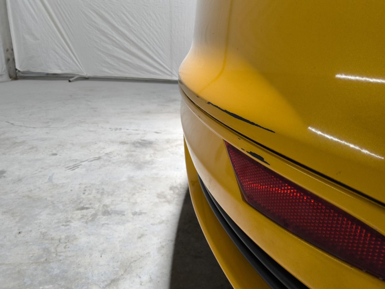 2014 Ford Focus St Yellow vin: 1FADP3L99EL345631 Damage: Rear Bumper, Heavy Scratch, 1 To 2 Inches