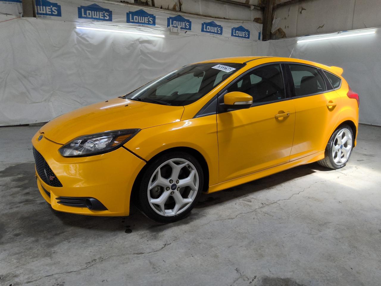 2014 Ford Focus St Yellow vin: 1FADP3L99EL345631 Damage: Left Front Tire, Worn, Replacement Required