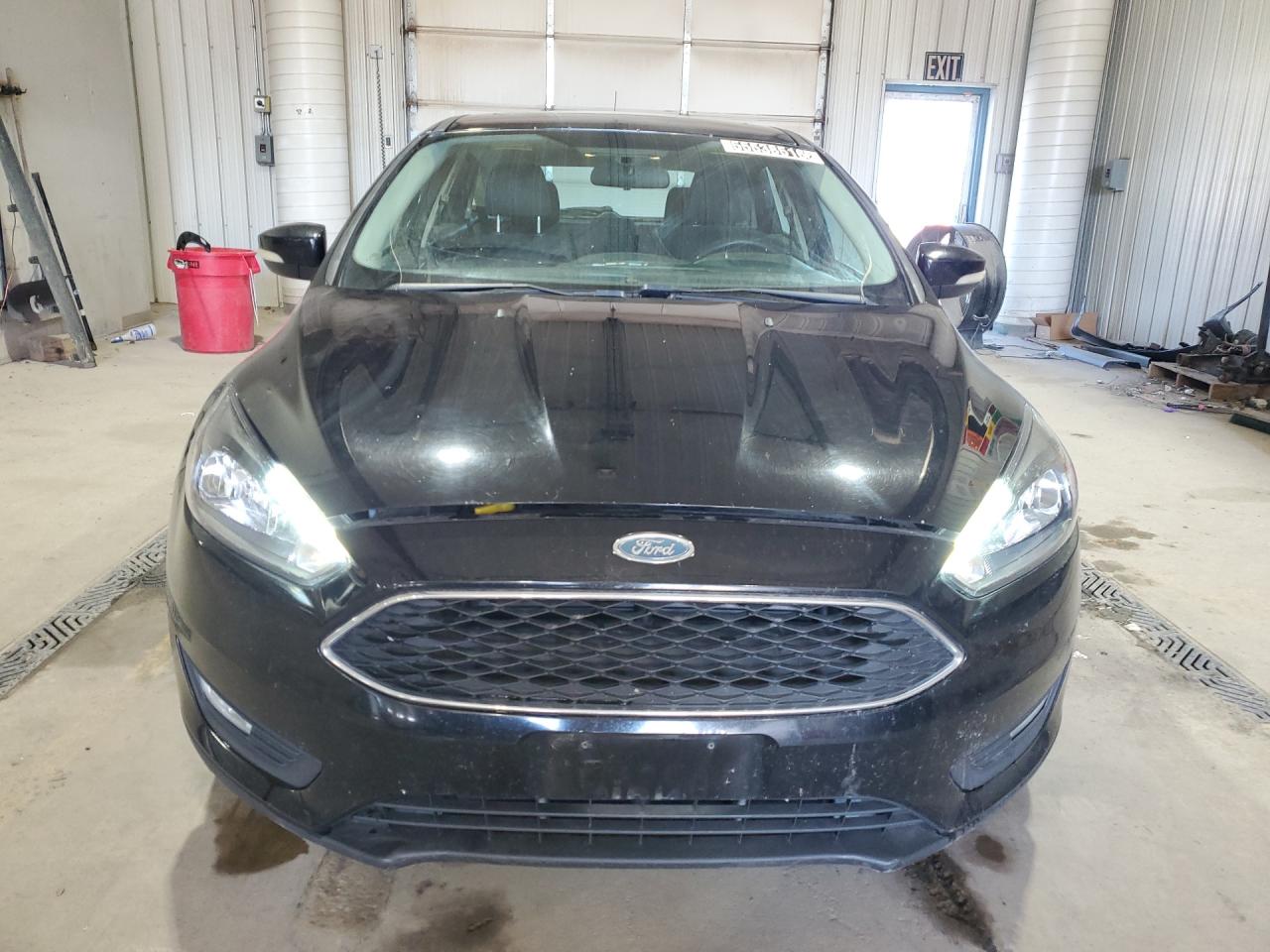 2017 Ford Focus Sel Black vin: 1FADP3M26HL249204 Damage: Hood, Misaligned, Repair Required
