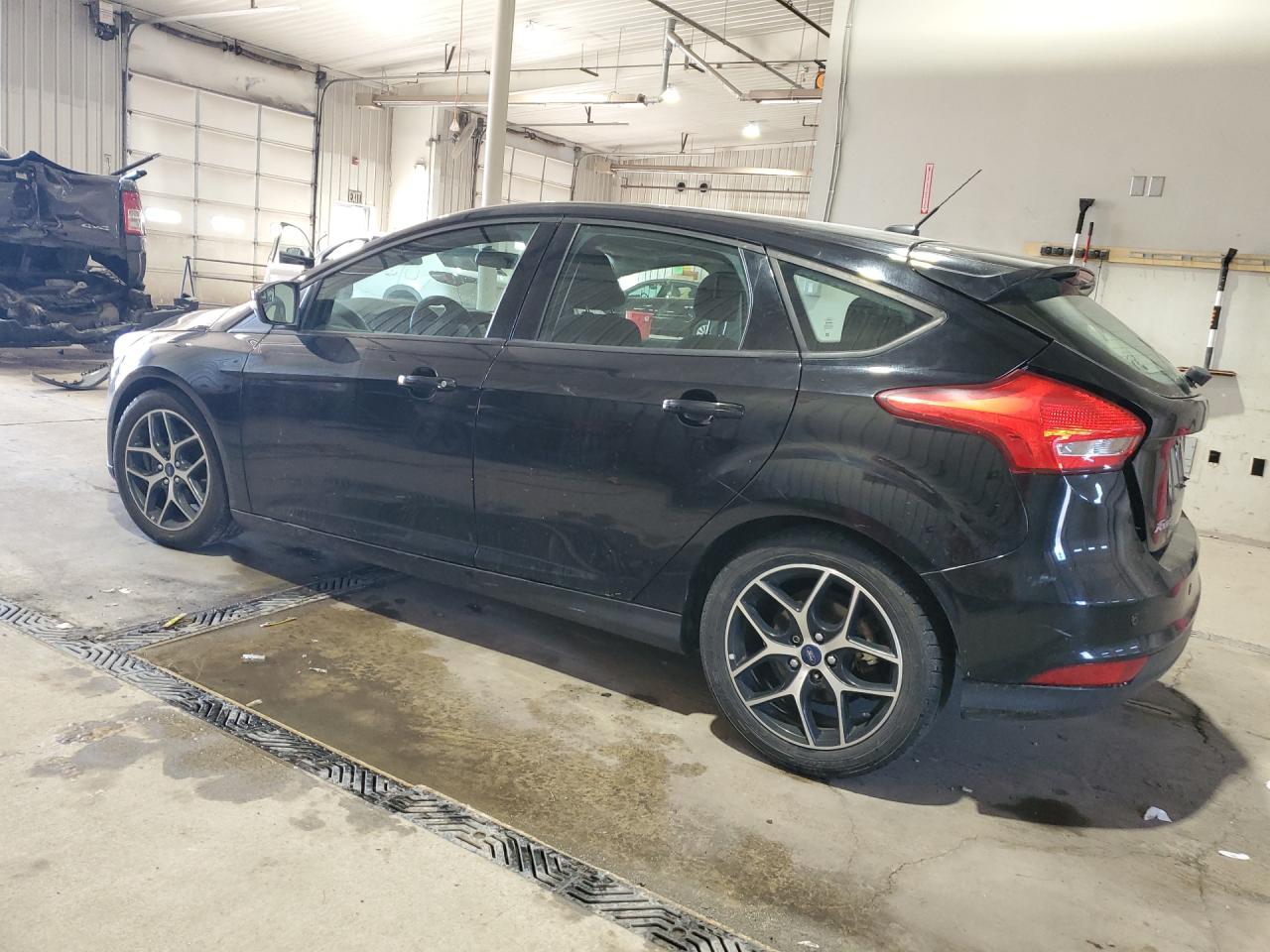 2017 Ford Focus Sel Black vin: 1FADP3M26HL249204 Damage: Lift Gate, Misaligned, Repair Required