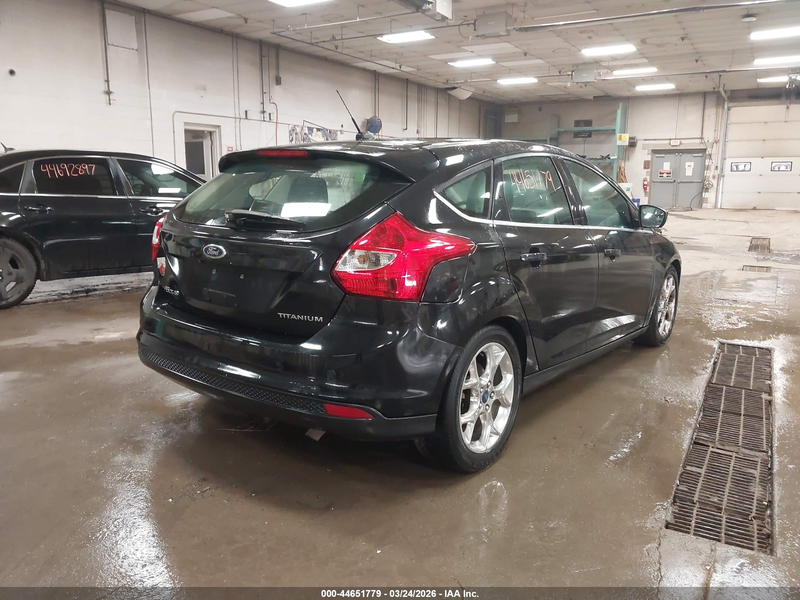 2014 Ford Focus Titanium Black vin: 1FADP3N20EL158925