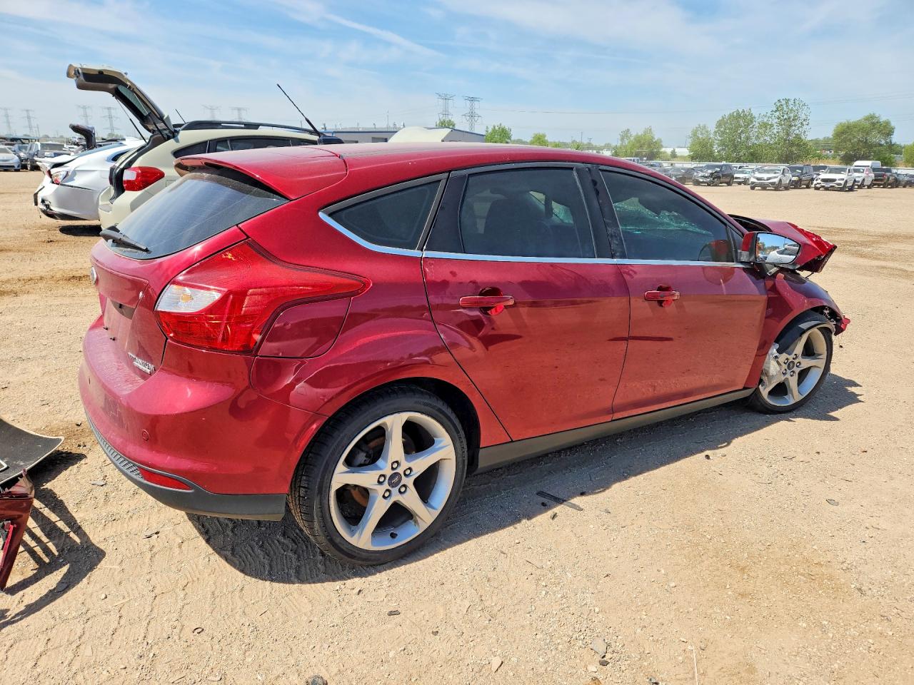 2014 Ford Focus Titanium Red vin: 1FADP3N20EL258295