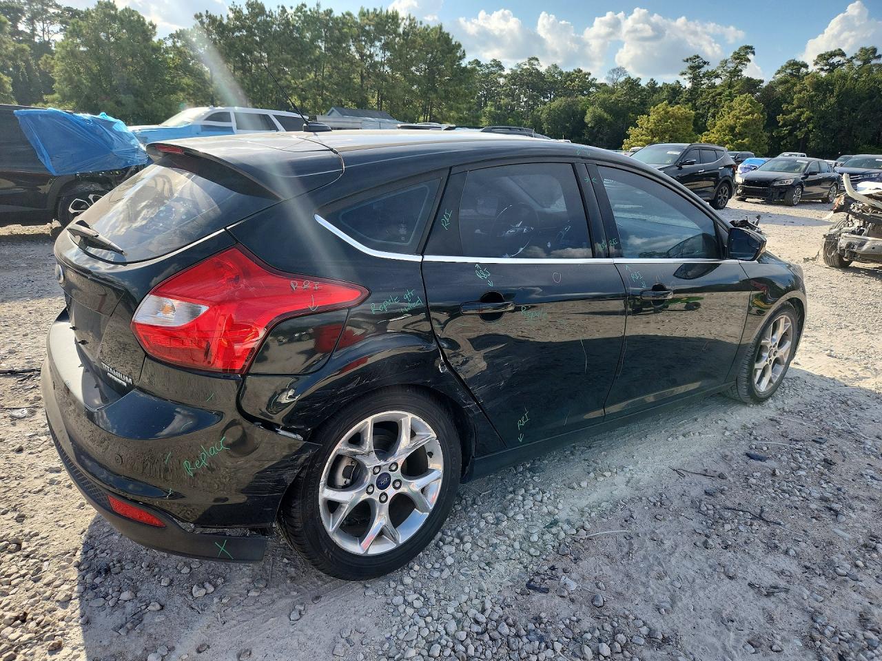 2014 Ford Focus Titanium Black vin: 1FADP3N20EL281124