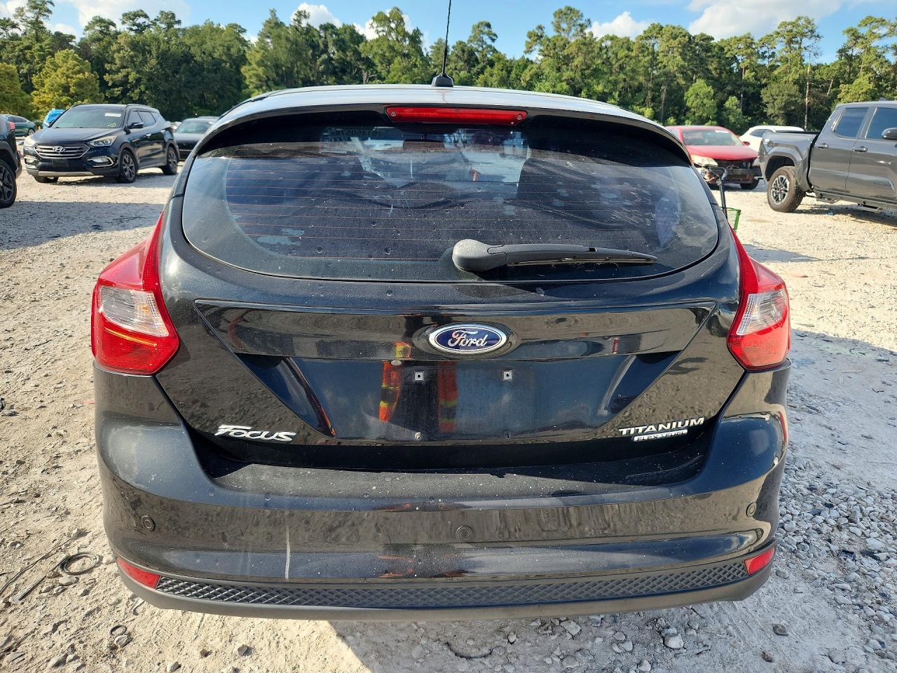 2014 Ford Focus Titanium Black vin: 1FADP3N20EL281124