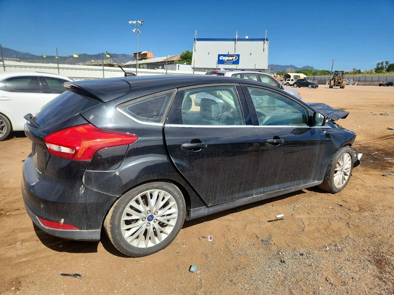 2015 Ford Focus Titanium Черный vin: 1FADP3N20FL279326
