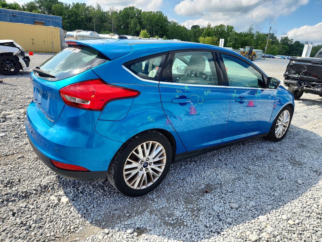2015 Ford Focus Titanium Blue vin: 1FADP3N20FL386604