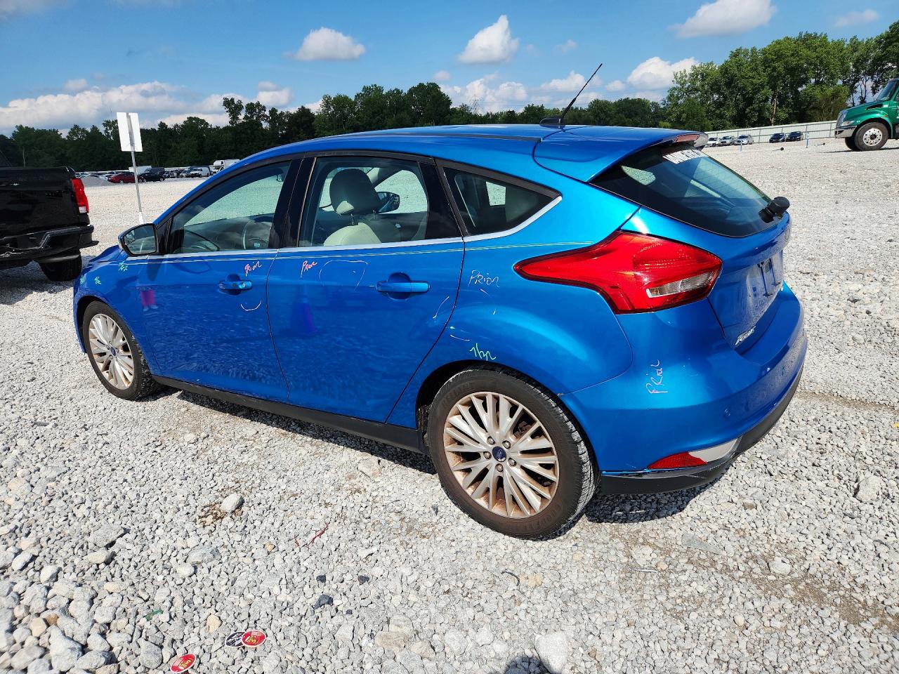 2015 Ford Focus Titanium Blue vin: 1FADP3N20FL386604