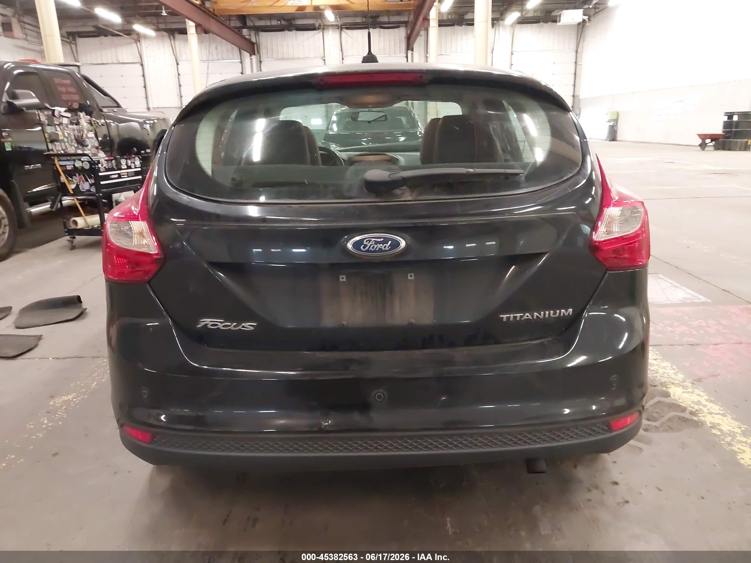 2013 Ford Focus Titanium Black vin: 1FADP3N21DL335609
