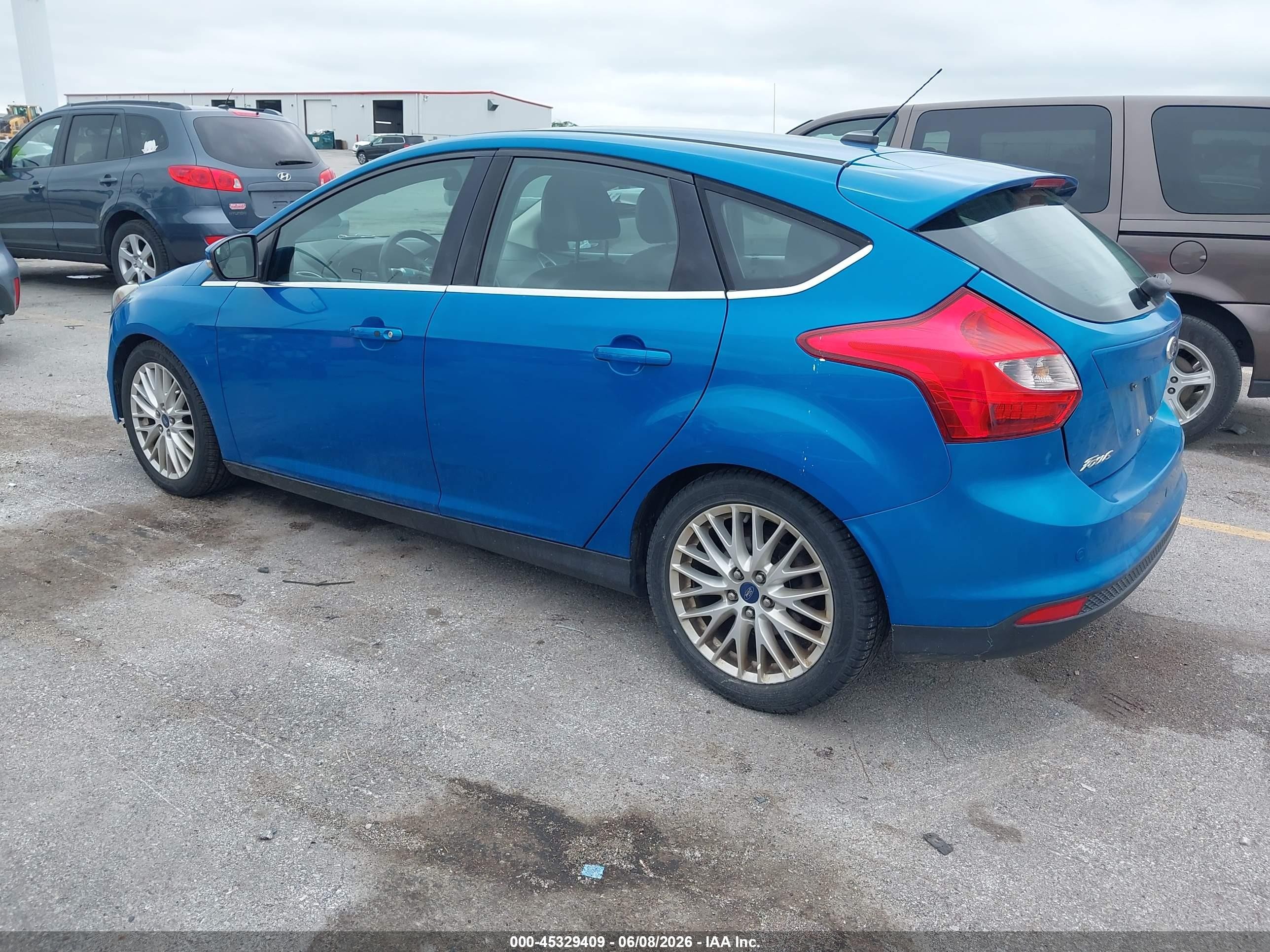 2014 Ford Focus Titanium Blue vin: 1FADP3N21EL102332
