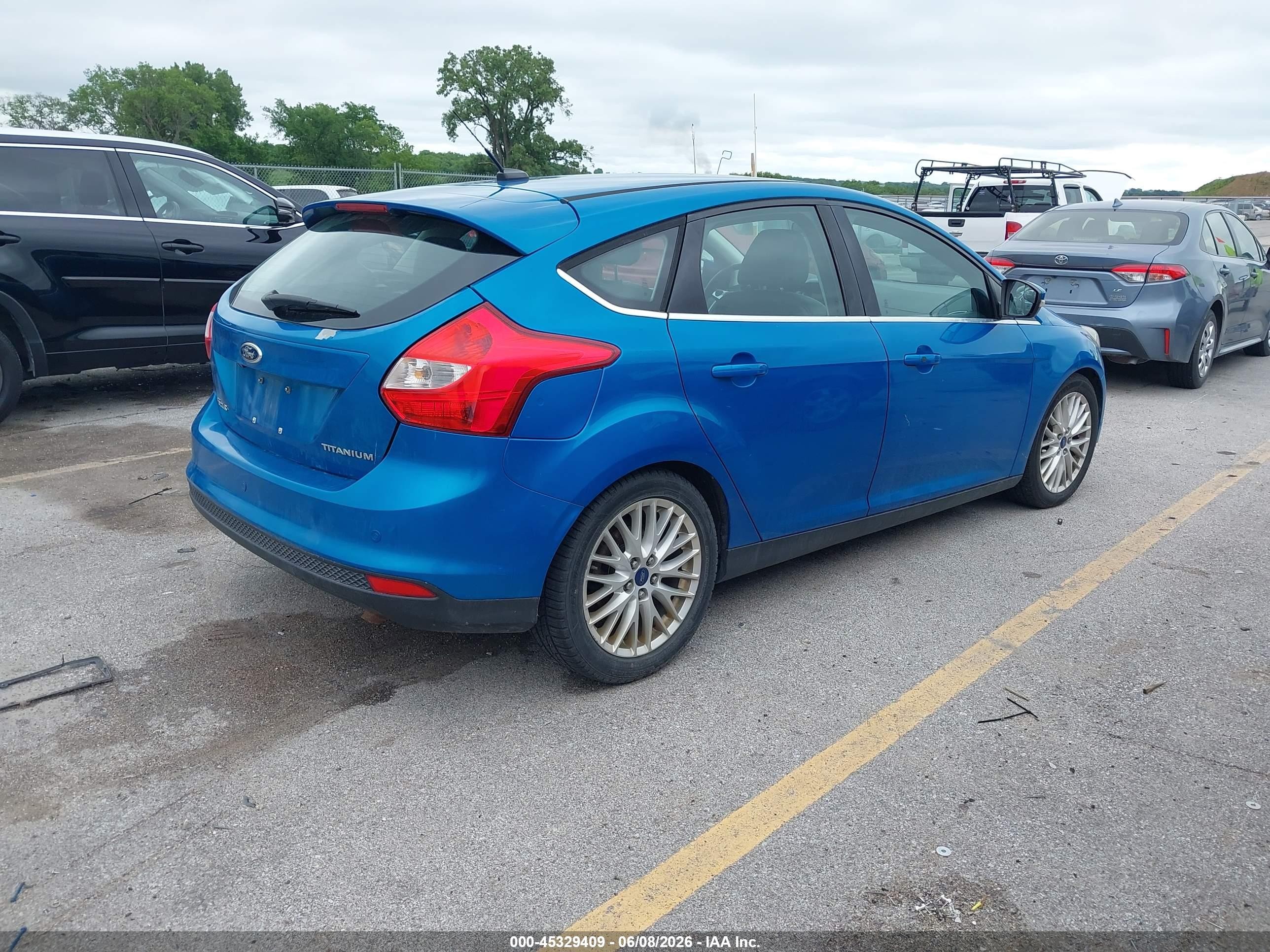 2014 Ford Focus Titanium Blue vin: 1FADP3N21EL102332