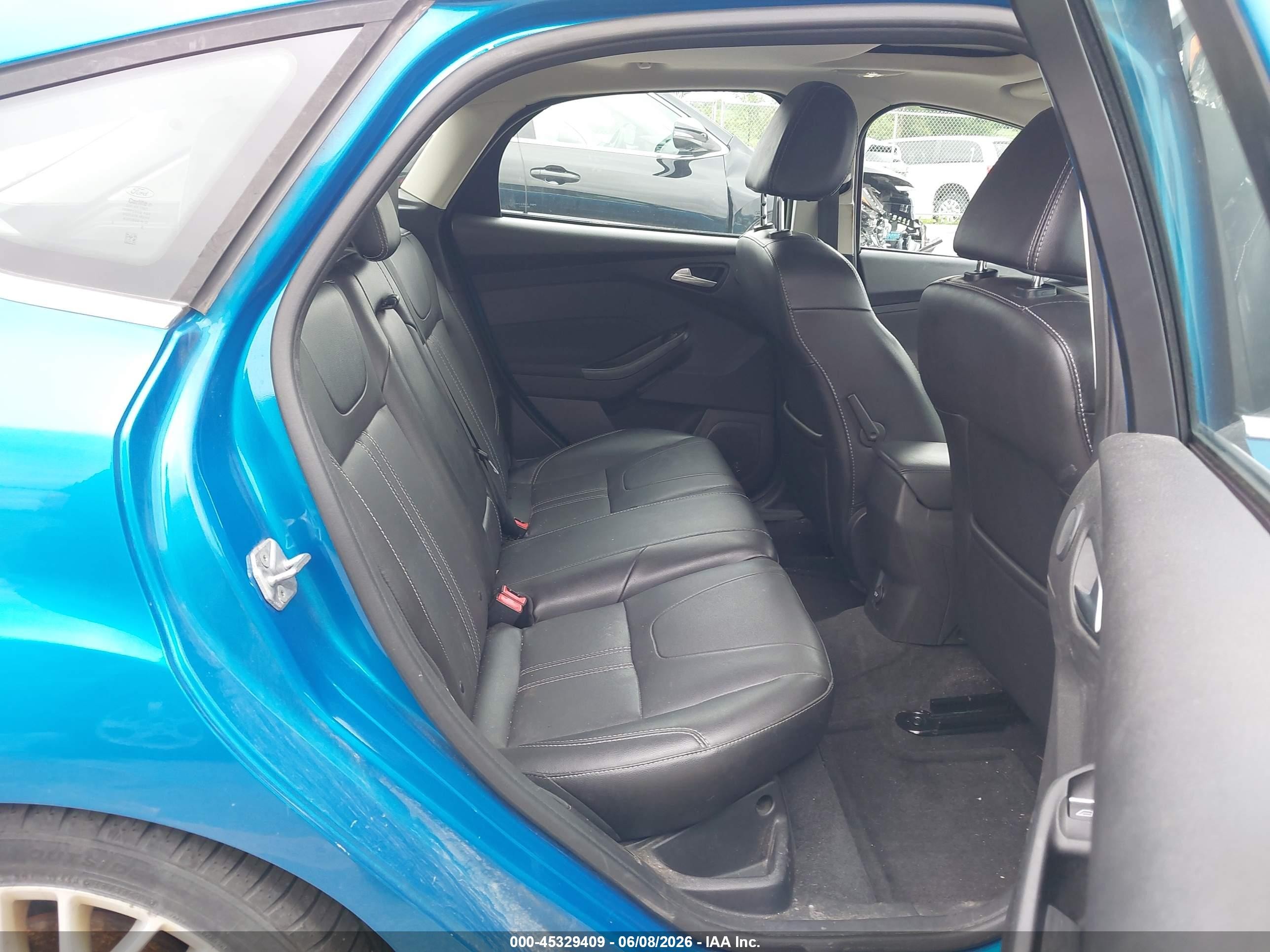 2014 Ford Focus Titanium Blue vin: 1FADP3N21EL102332