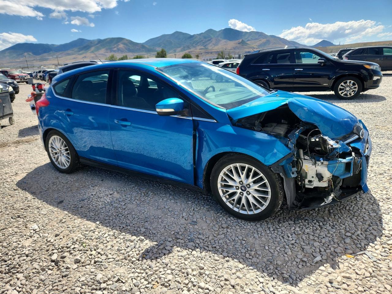 2014 Ford Focus Titanium Blue vin: 1FADP3N21EL213253