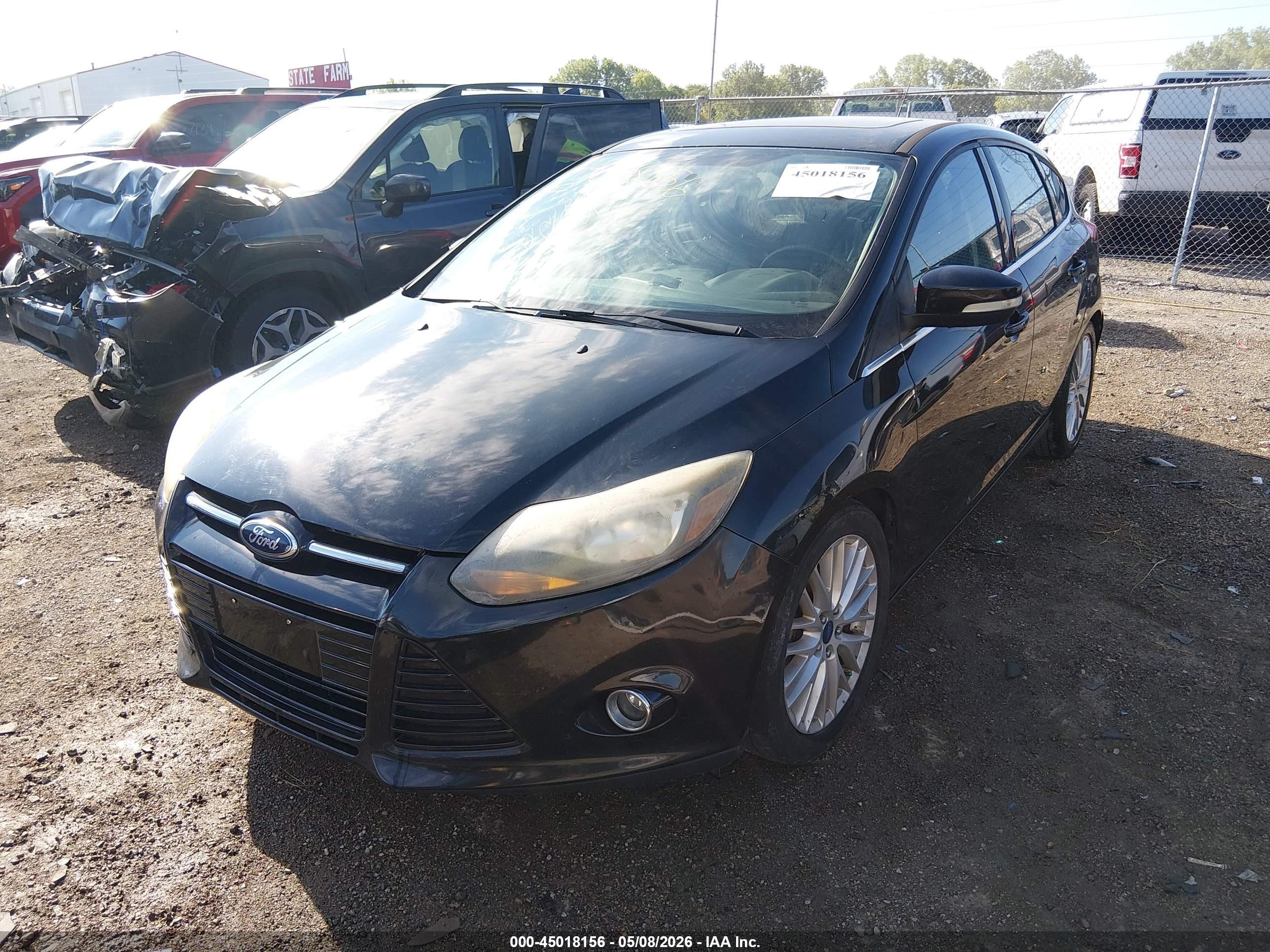 2014 Ford Focus Titanium Black vin: 1FADP3N21EL221790