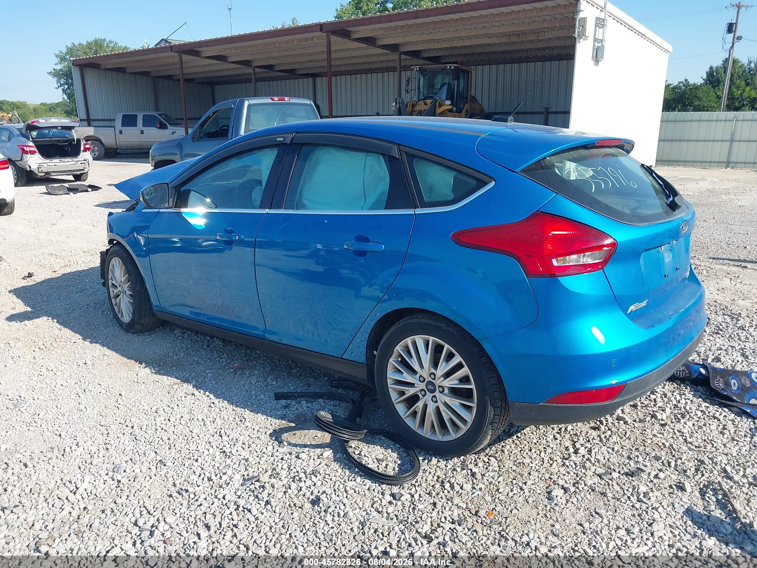 2015 Ford Focus Titanium Blue vin: 1FADP3N21FL355796