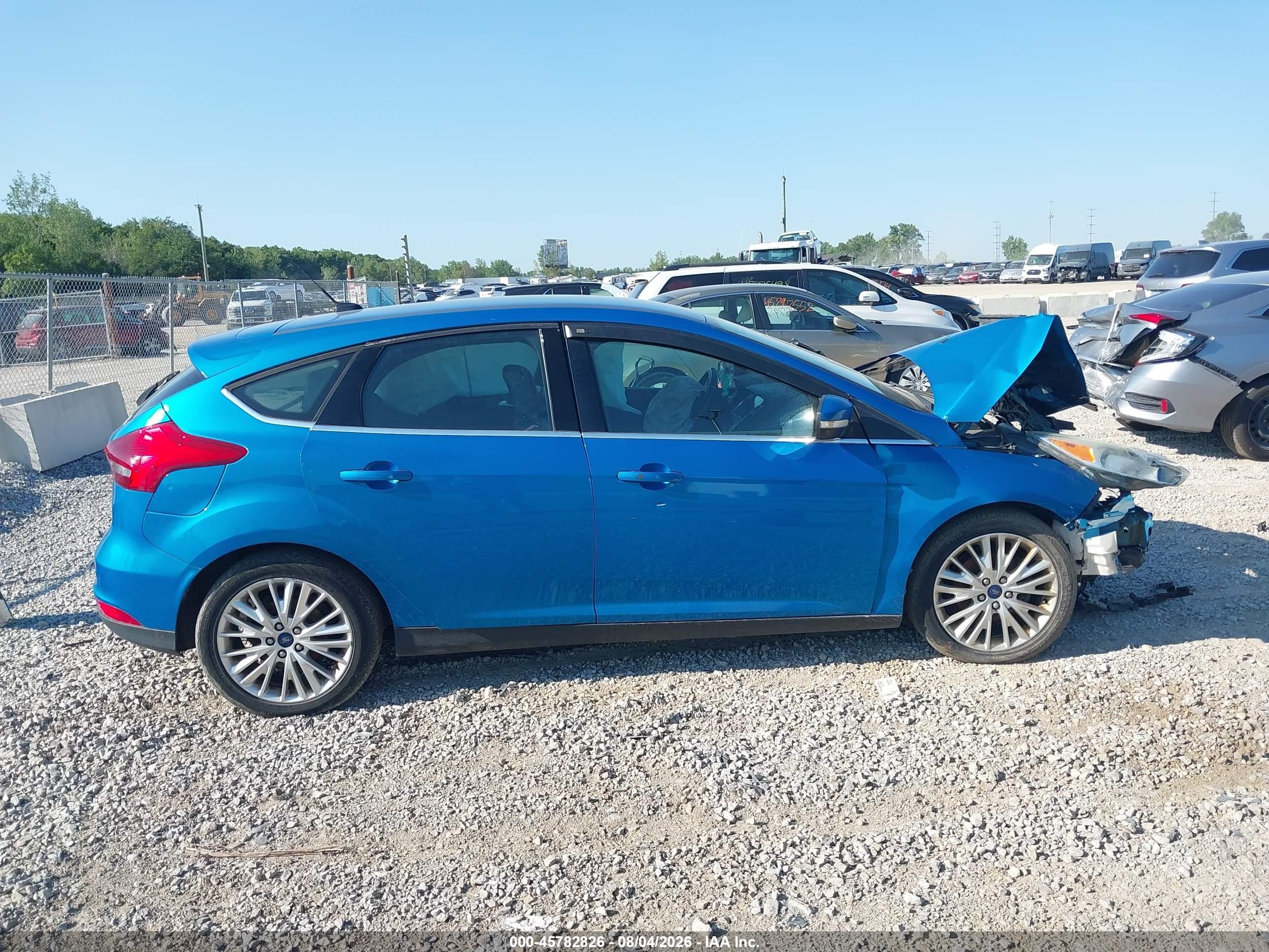 2015 Ford Focus Titanium Blue vin: 1FADP3N21FL355796
