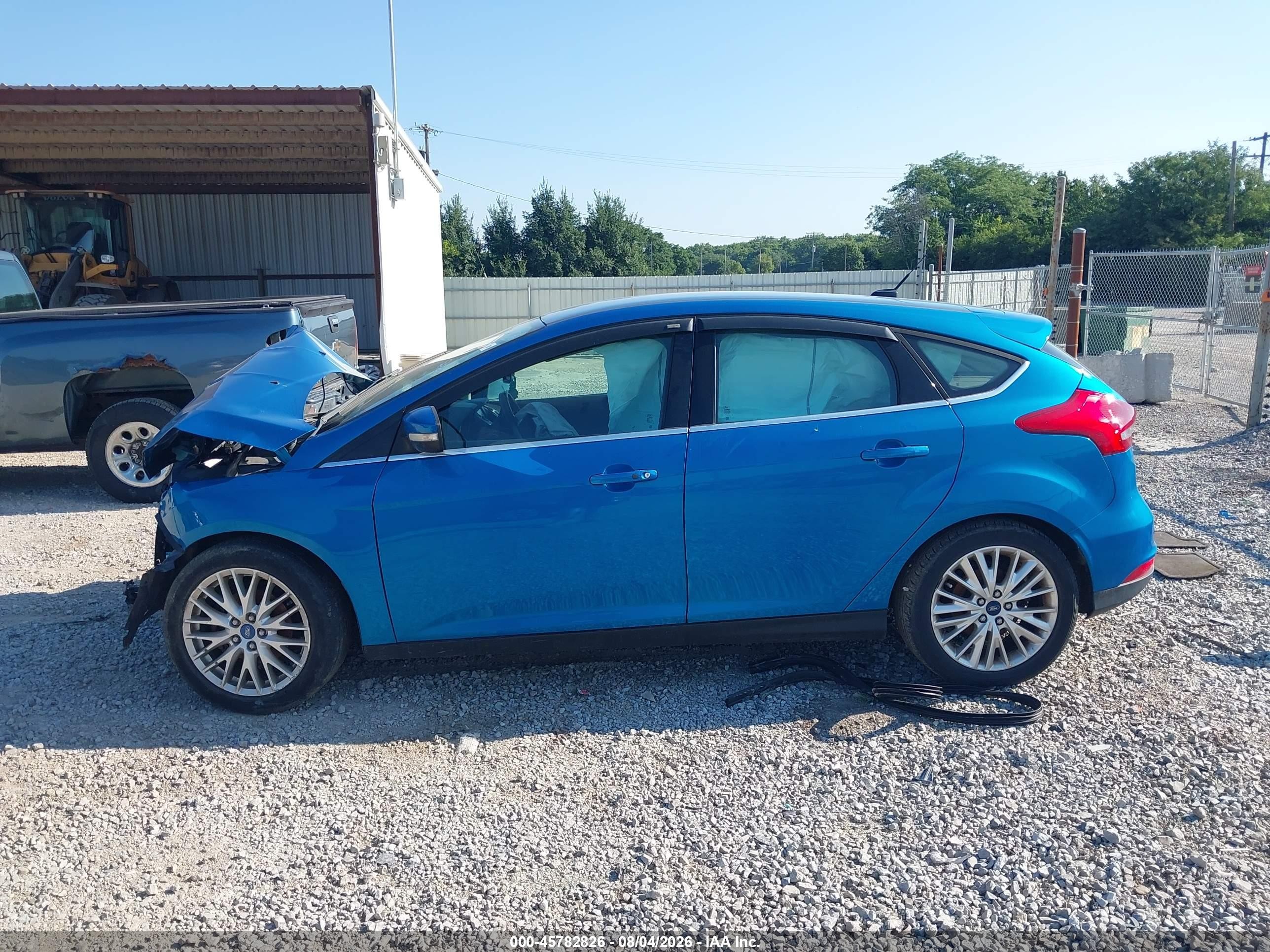 2015 Ford Focus Titanium Blue vin: 1FADP3N21FL355796